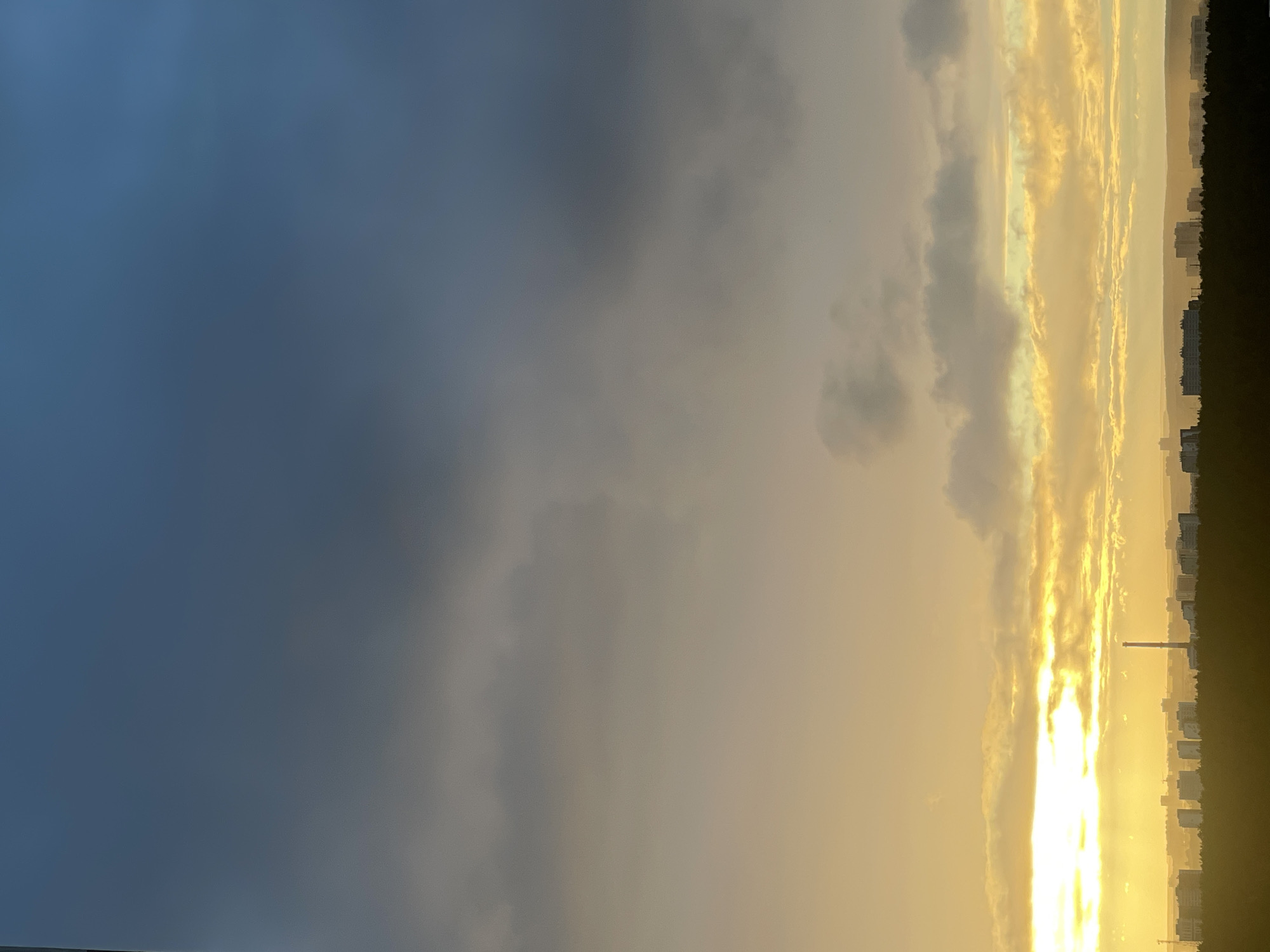 Dramatic sunset light splits the sky over Perm