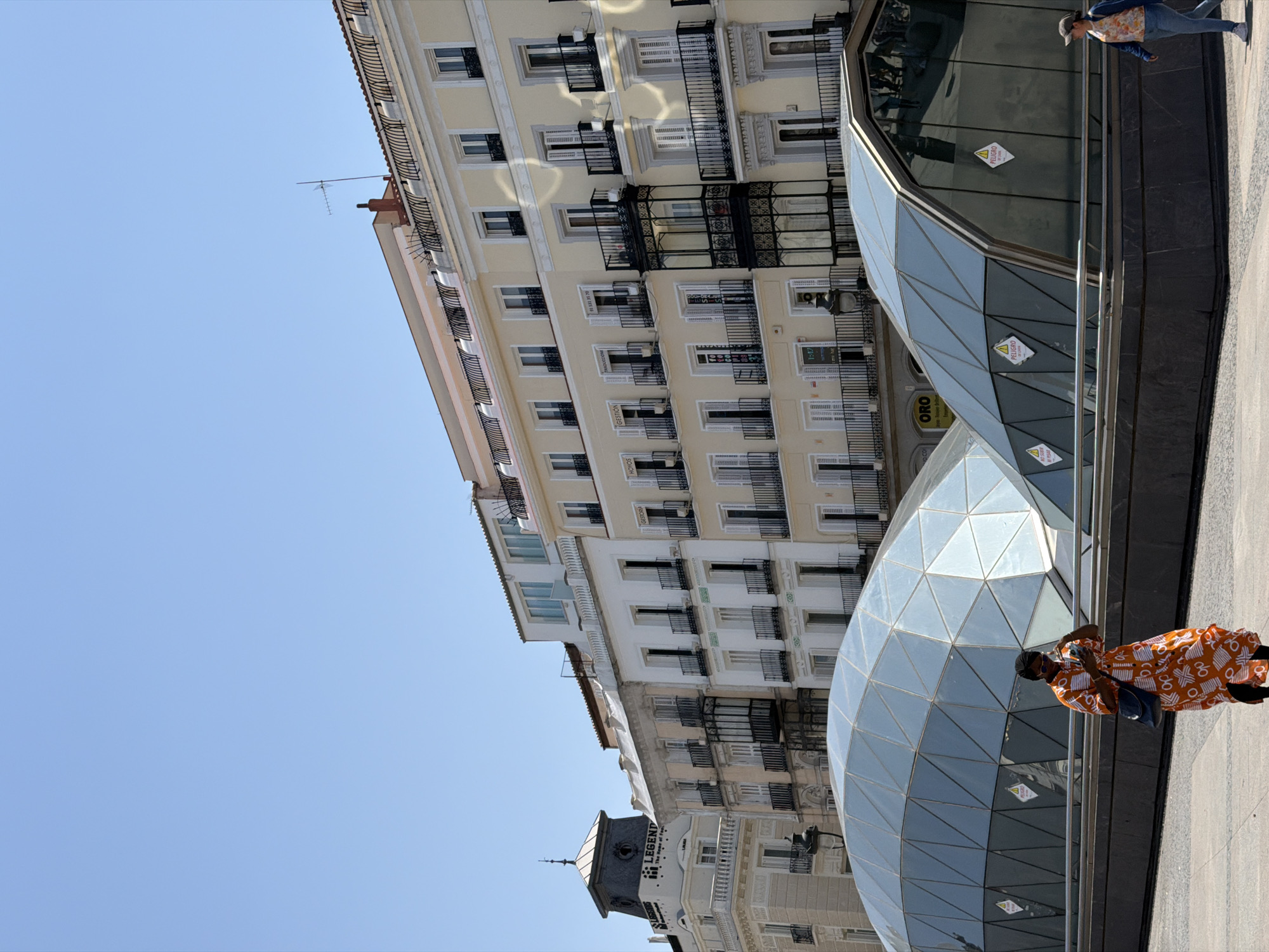 Busy midday scene at Puerta del Sol, Madrid