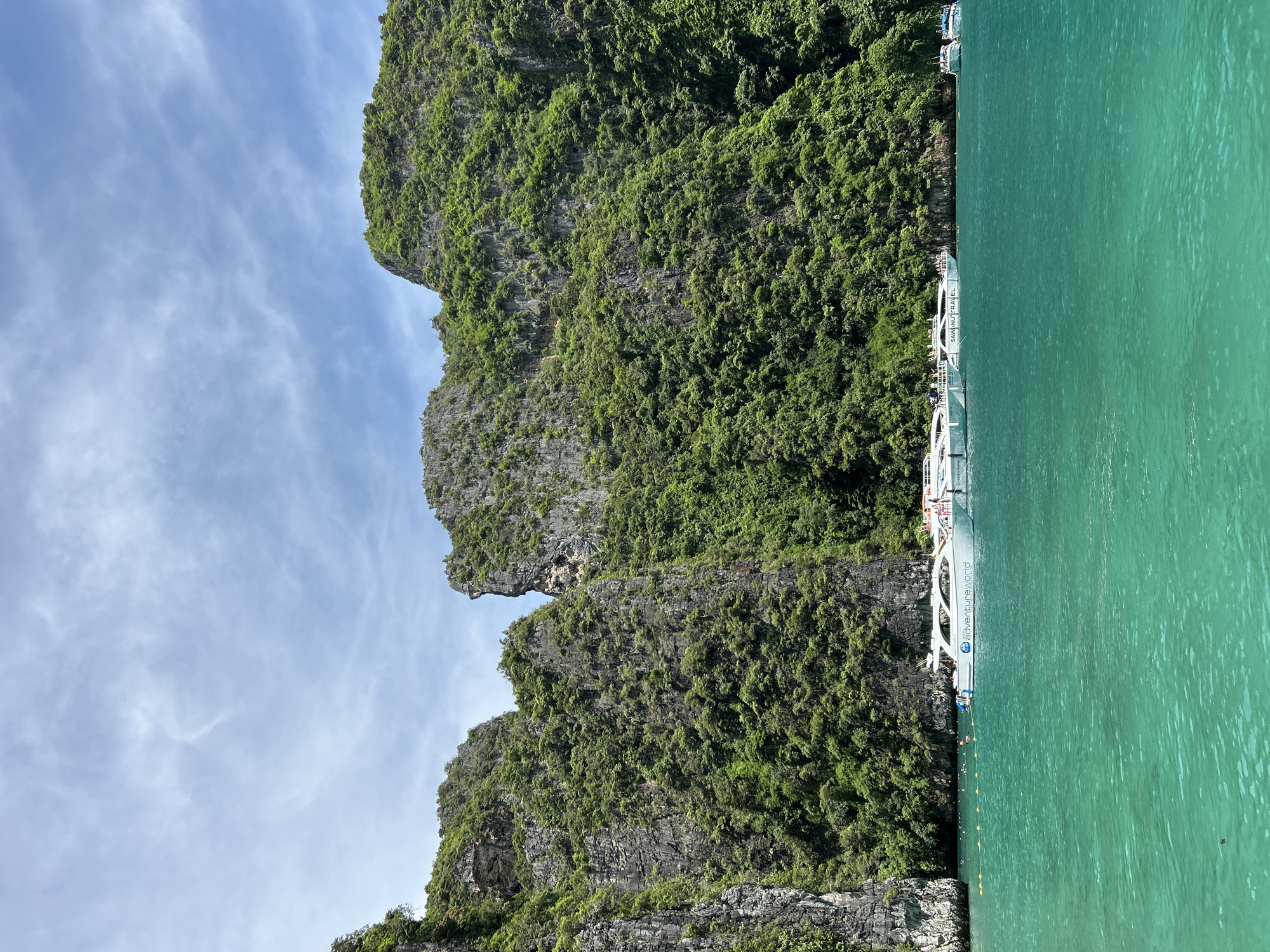 Longtail boats and limestone karsts at Ao Nang bay