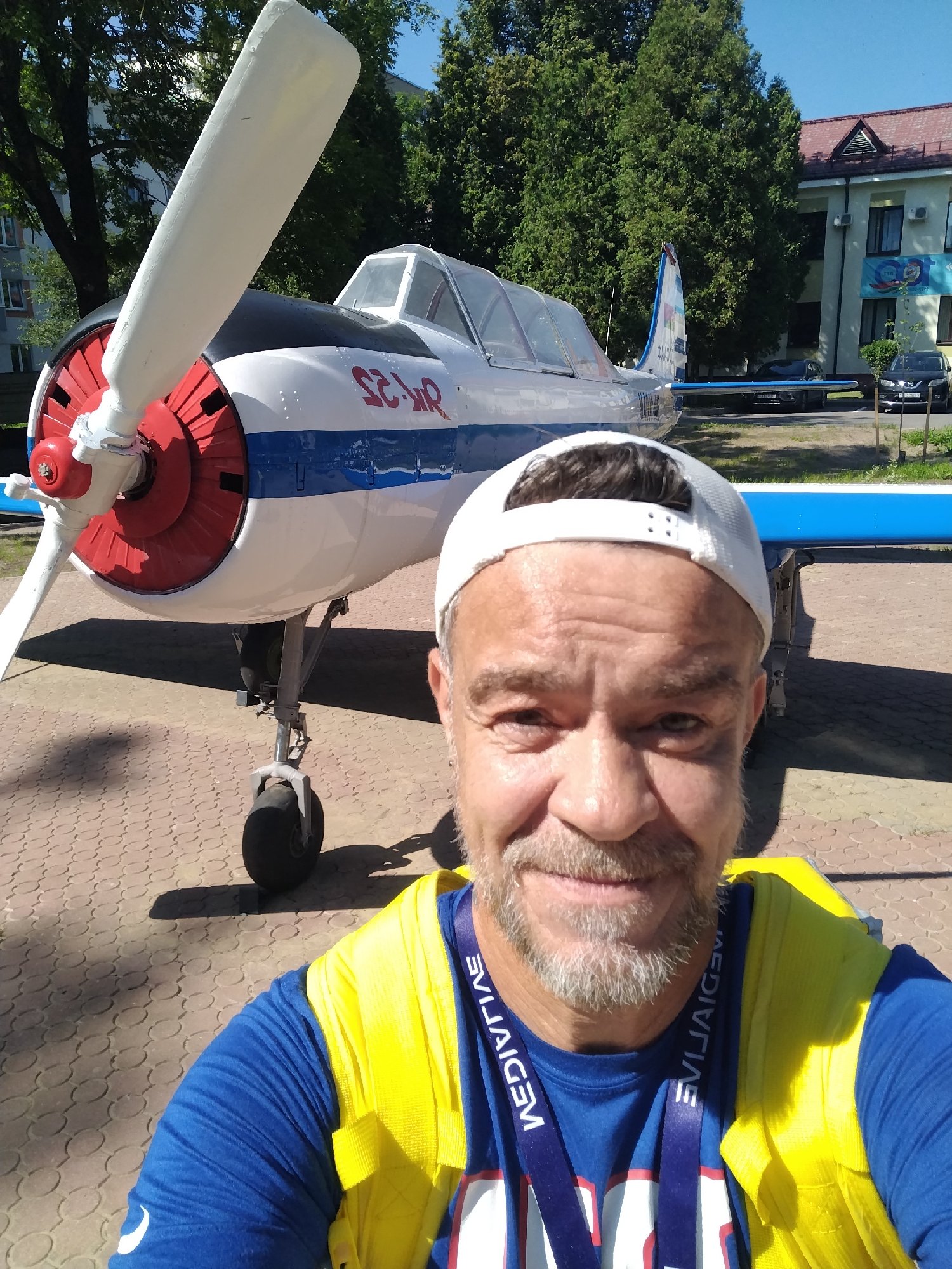 Selfie in front of a propeller plane in Minsk