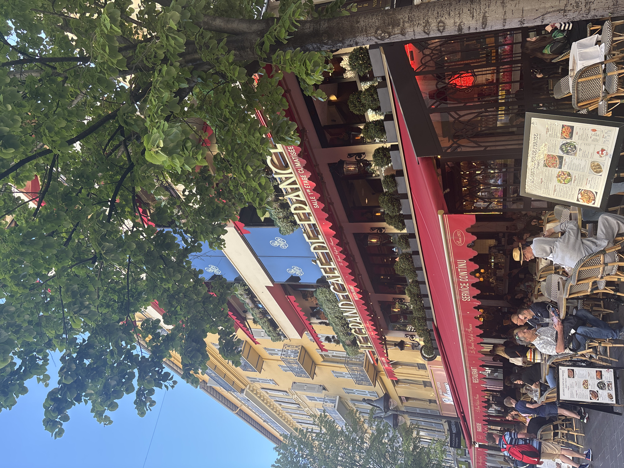 Diners gather at Le Grand Café de France in Nice