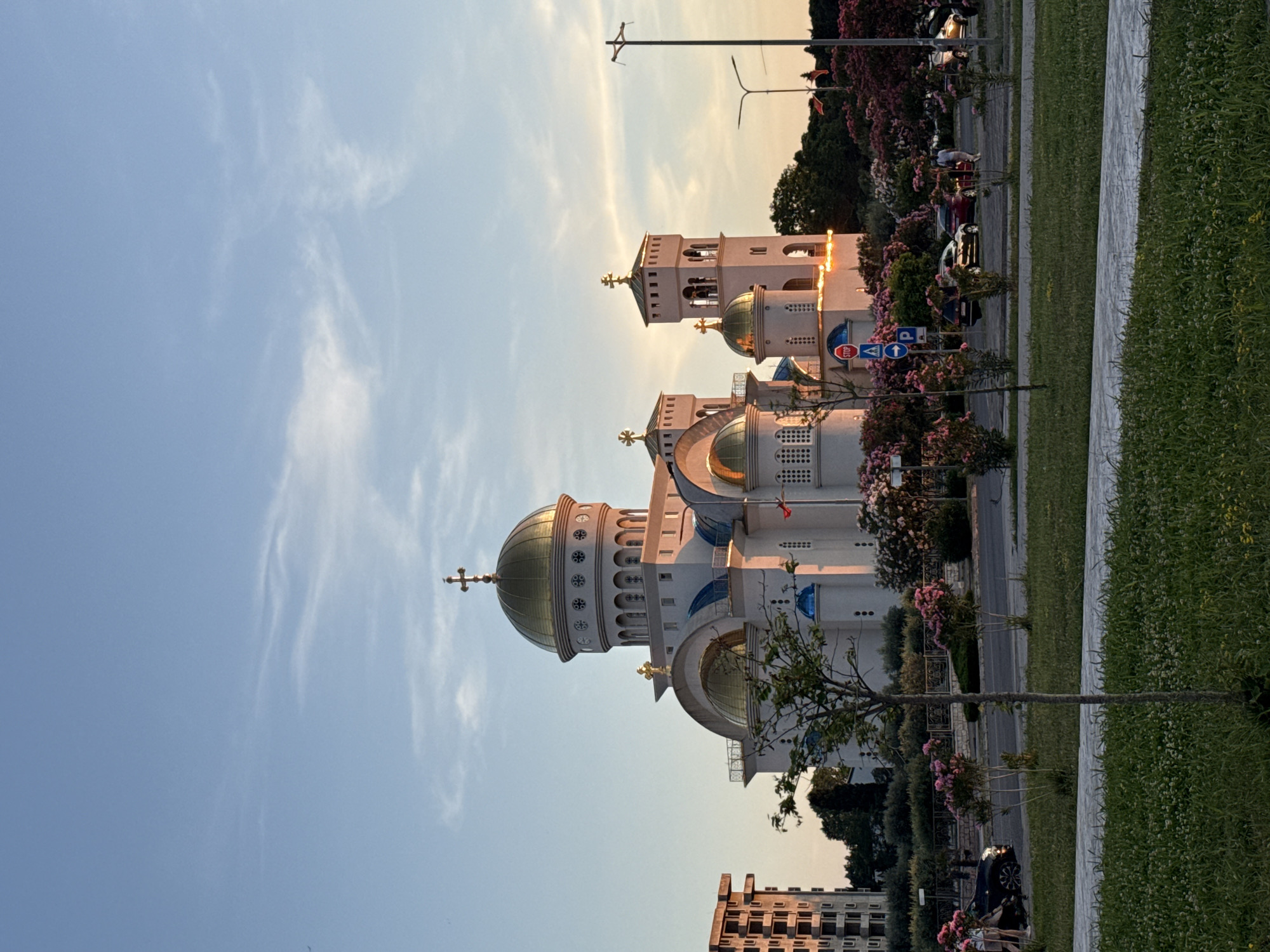 Golden hour in Bar: church, city views, and a dog with a ball