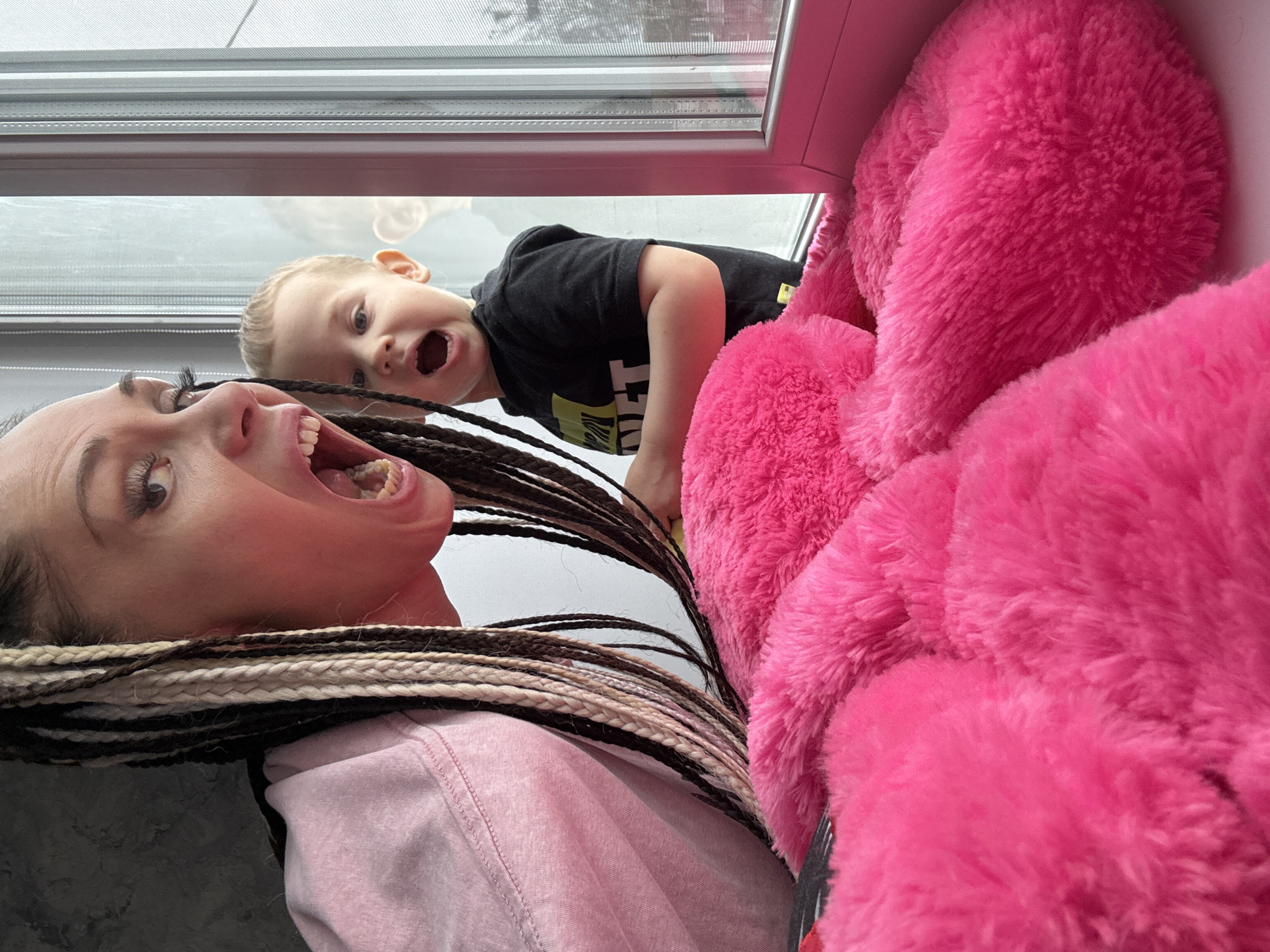 Mother and child share playful morning moments in Rusanovo