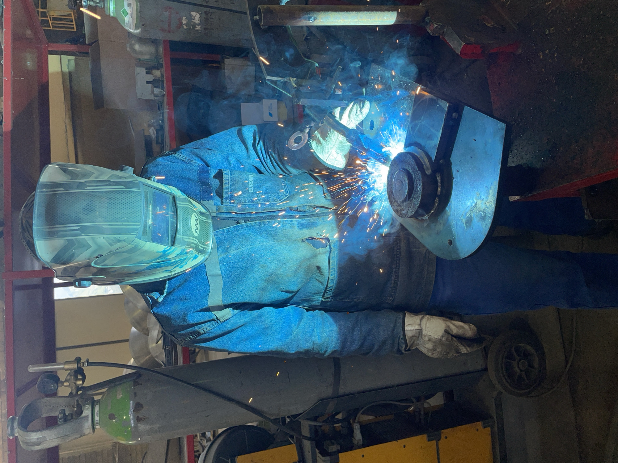 Welder conducts morning metalwork operations in Zaljevo workshop