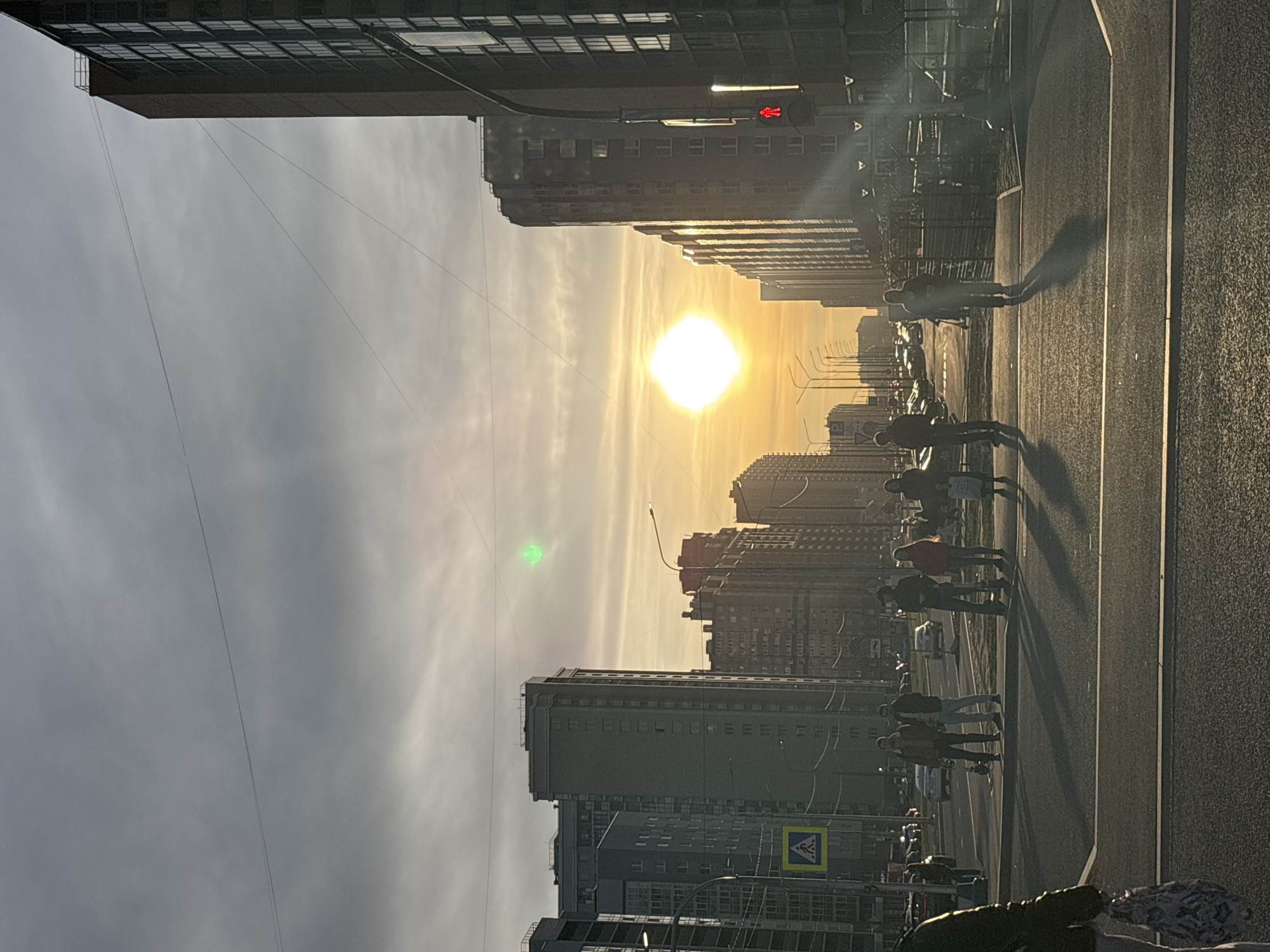 Golden hour street scene observed in Murino, Russia