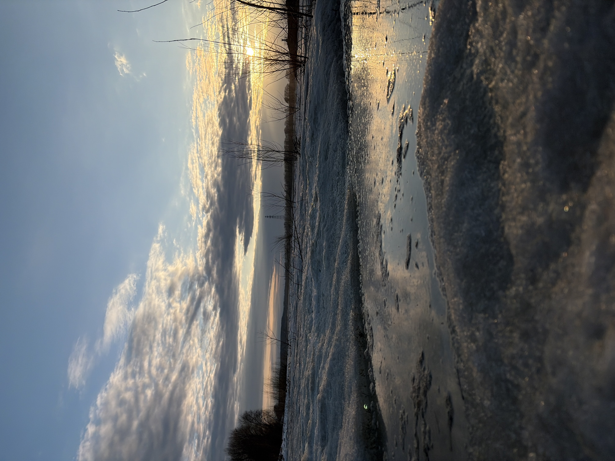 Winter river scenes documented during golden hour in Chaikovsky Russia