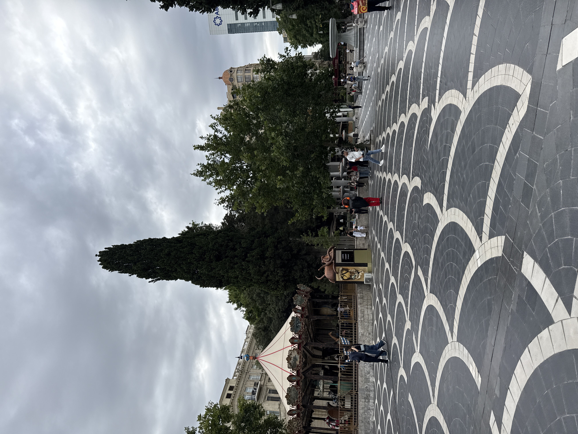 Central Baku square: carousels, monuments, and fast food side by side