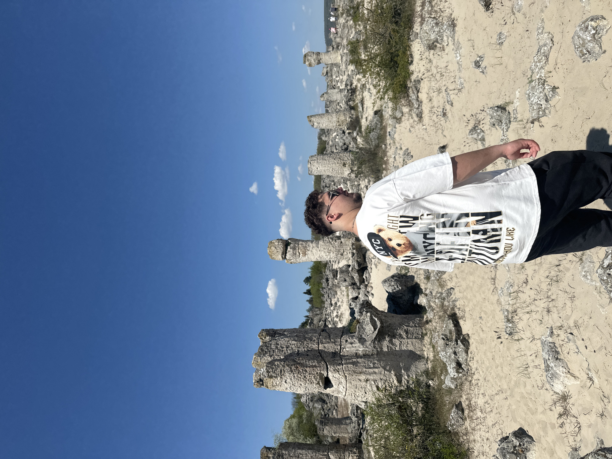 Tourist visits Stone Forest geological site near Slanchevo, Bulgaria
