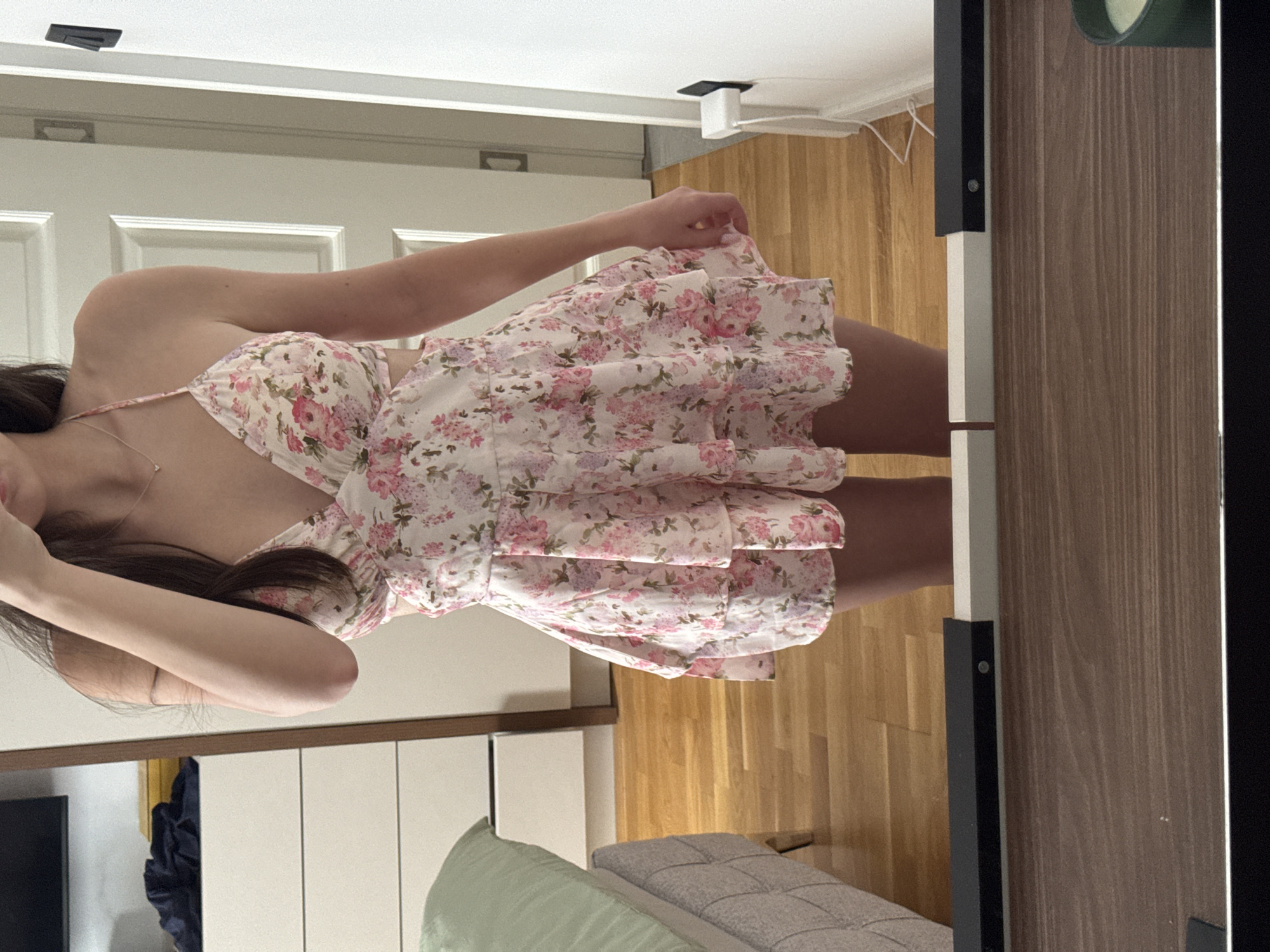 Mirror selfie session with floral dress and dog captured