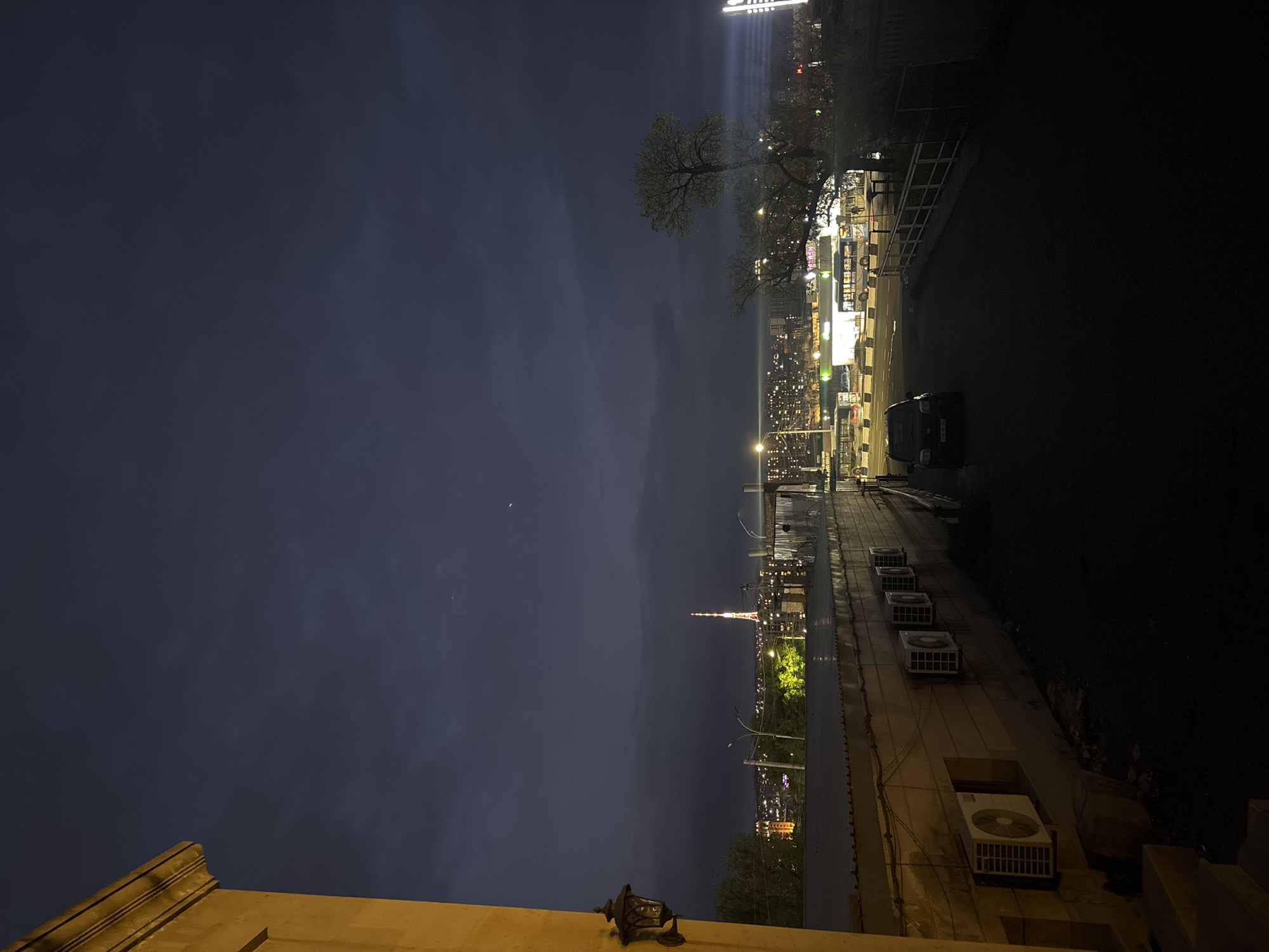 Yerevan TV Tower illuminated against twilight sky