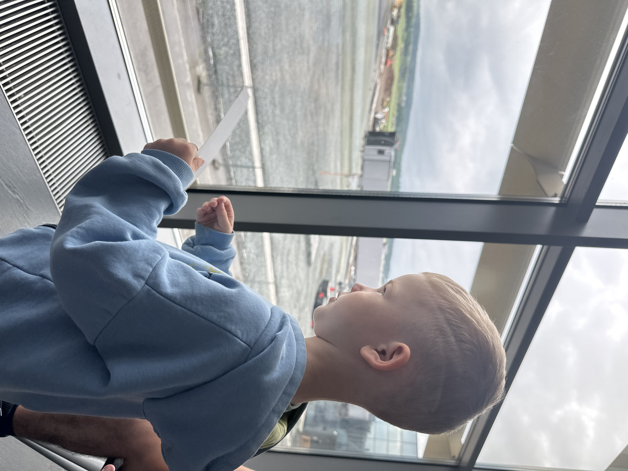 Airport layover in Perm: terminal windows, boarding passes, café snacks.