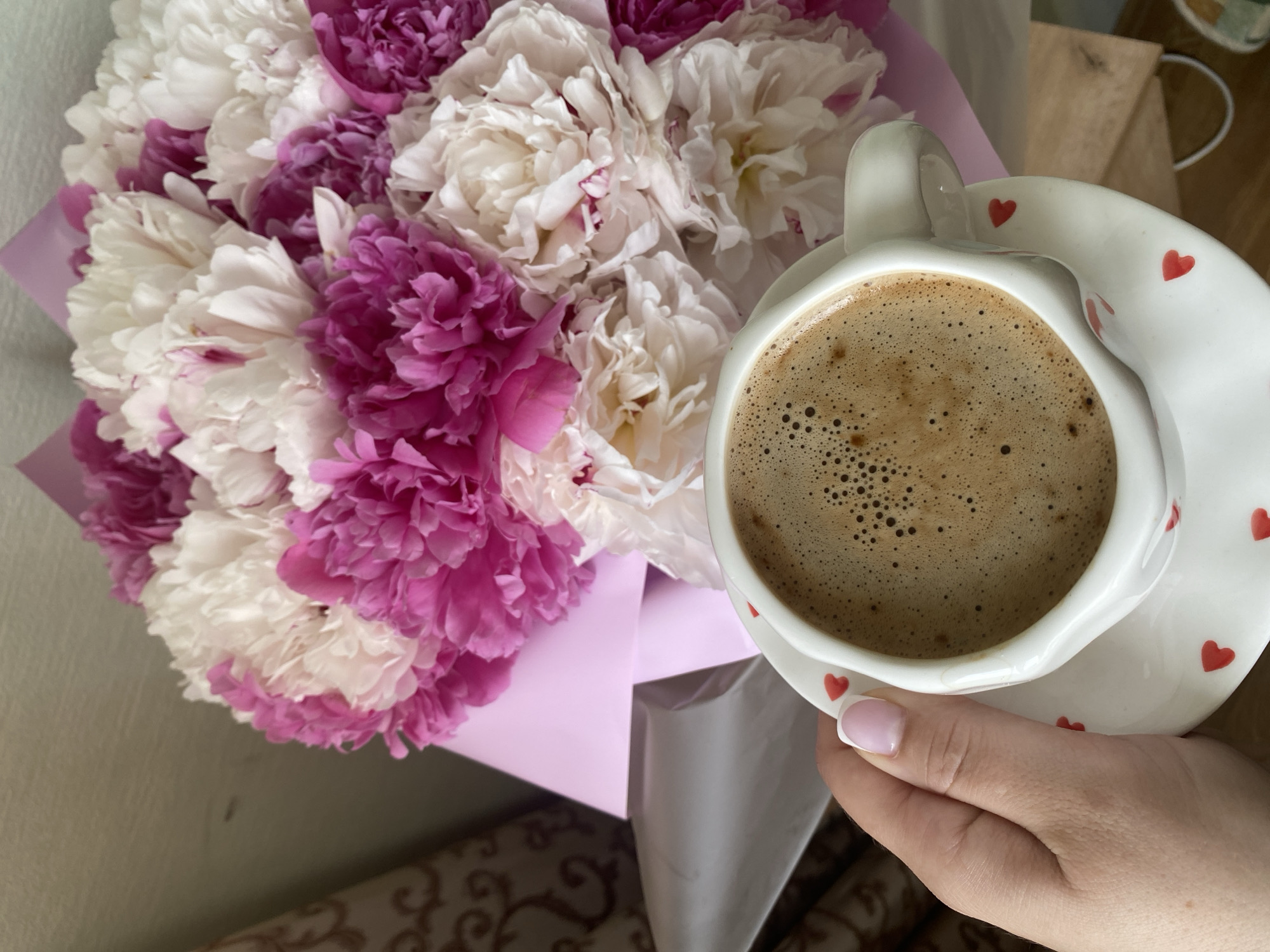 Morning coffee and peonies captured in Sochi