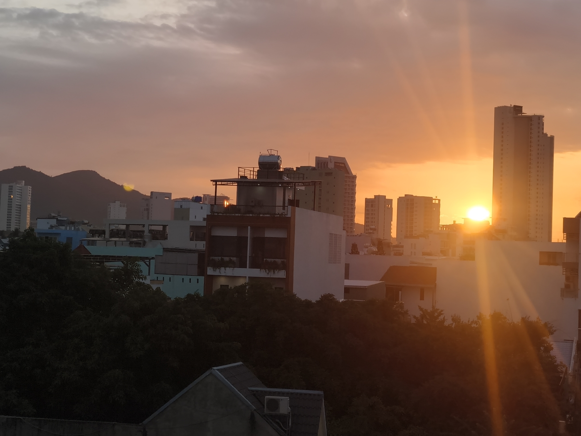 Nha Trang skyline at golden hour, multiple perspectives