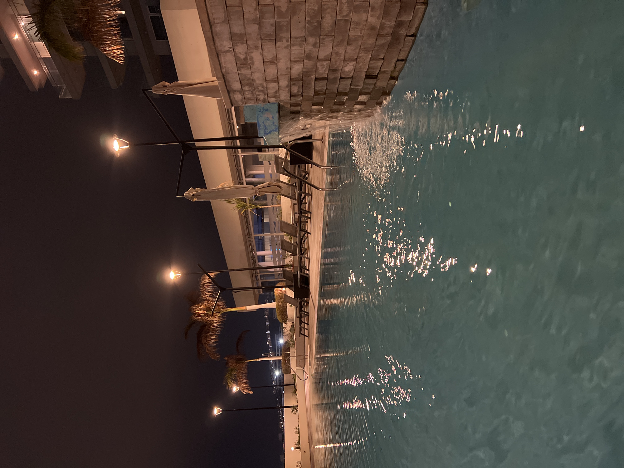 Nighttime hotel event and poolside scenes in Arica, Chile