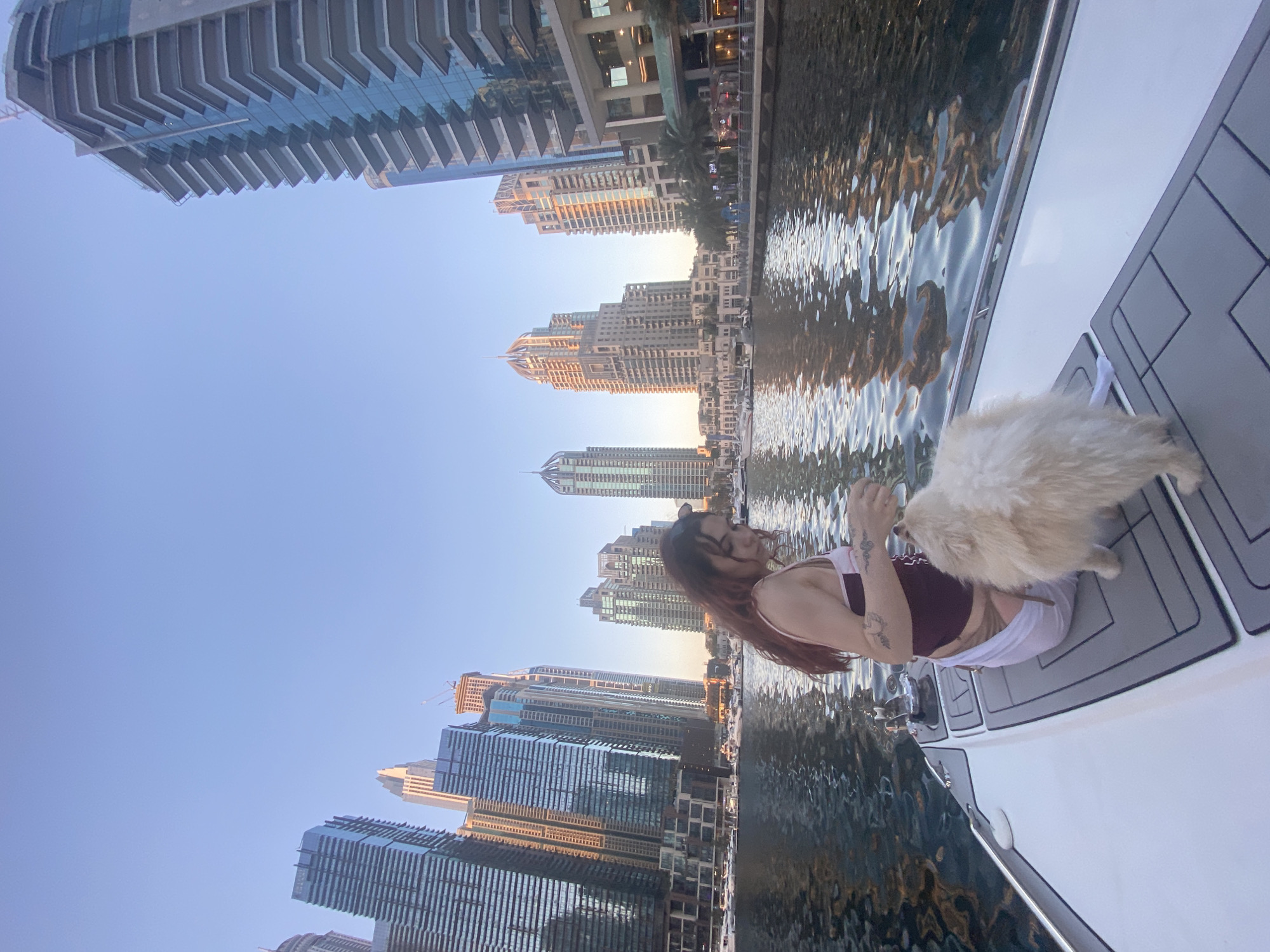 Boat ride through Dubai Marina with passenger and dog