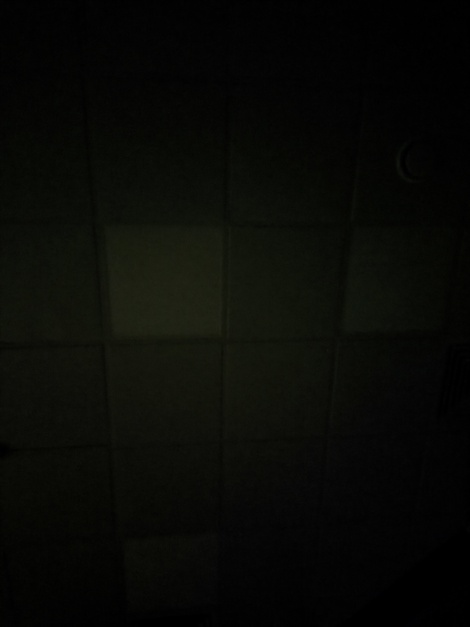 Witness documents dimly lit tiled wall in Moscow