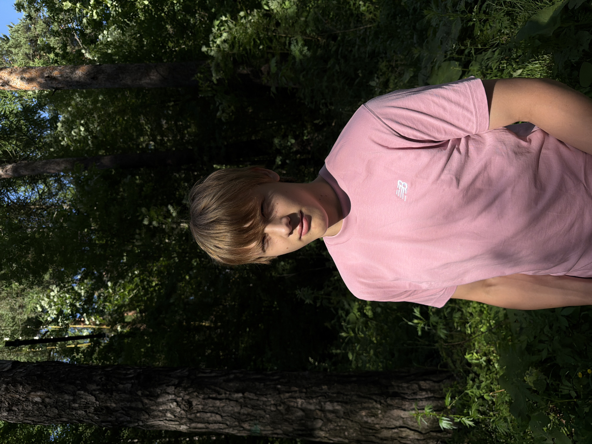 Casual outdoor portraits in an Izhevsk forest, sunny afternoon