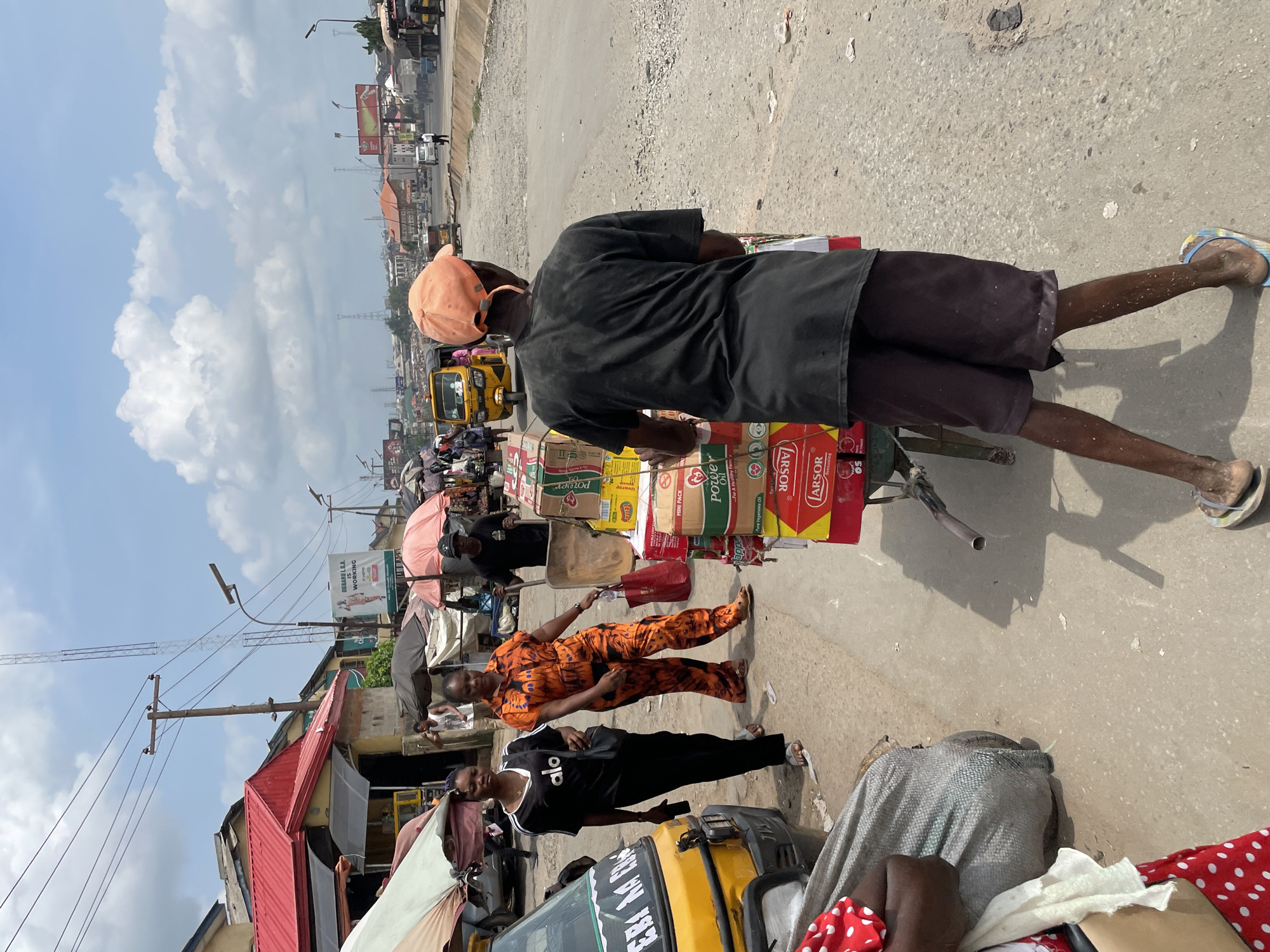 Daily market life documented across Nigerian commercial districts