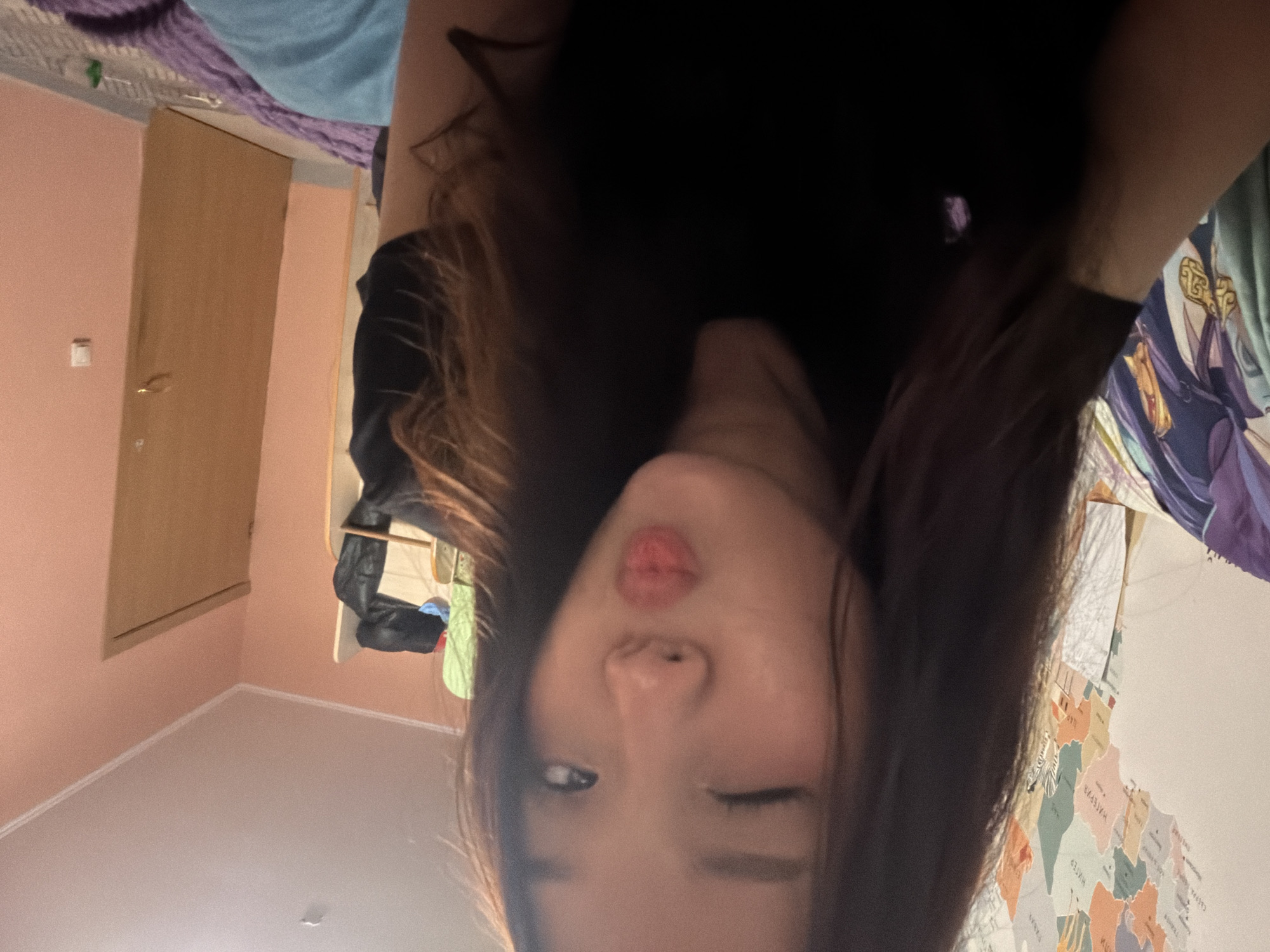 Woman takes artistic selfie session in Russian bedroom