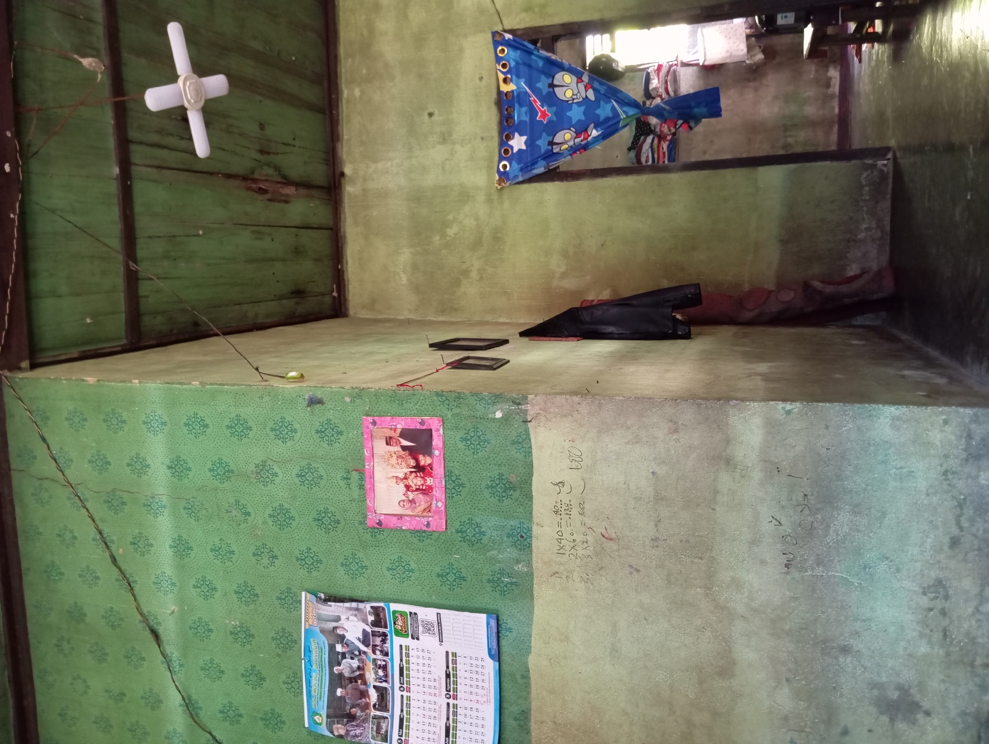 Quiet afternoon inside a Rejosari home with signs of celebration