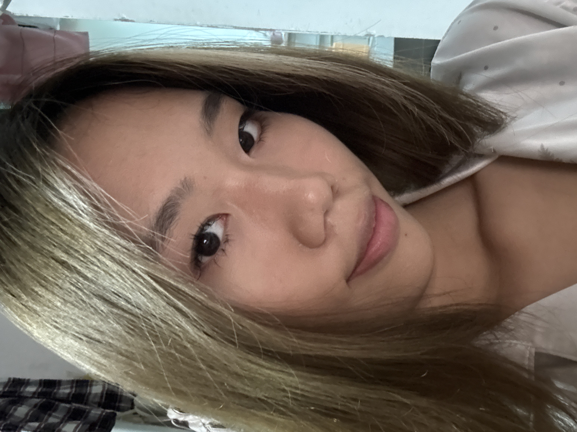 Young woman takes selfie in Nan'an District, China