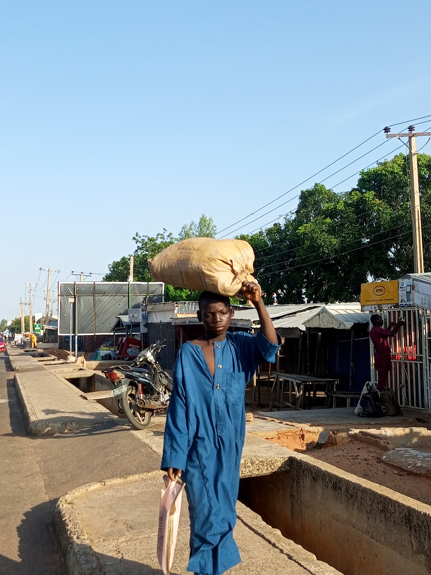 Morning street life across several Nigerian towns