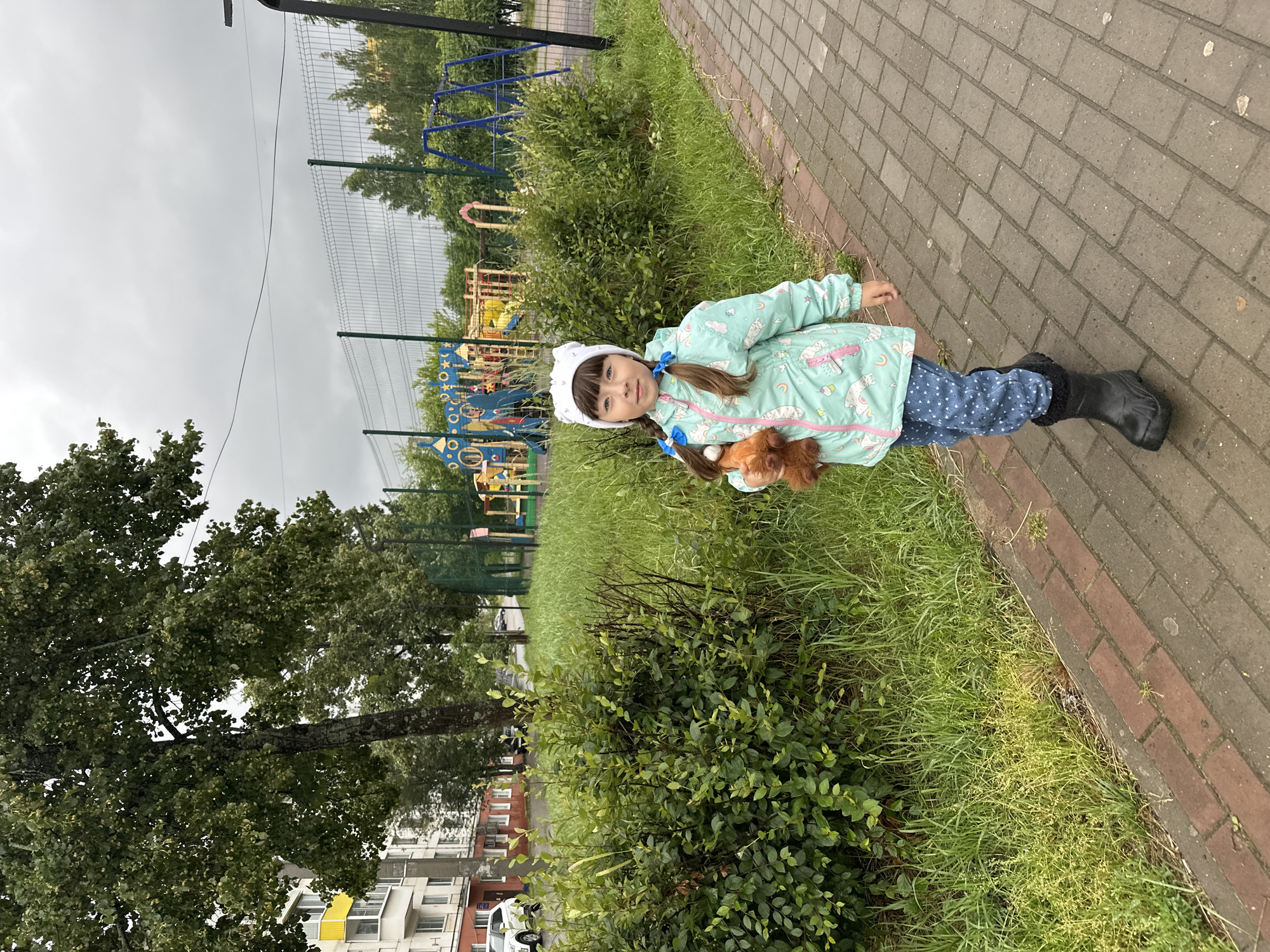 Rainy day out in Chaikovsky: wet streets, flowers, and a kids' café