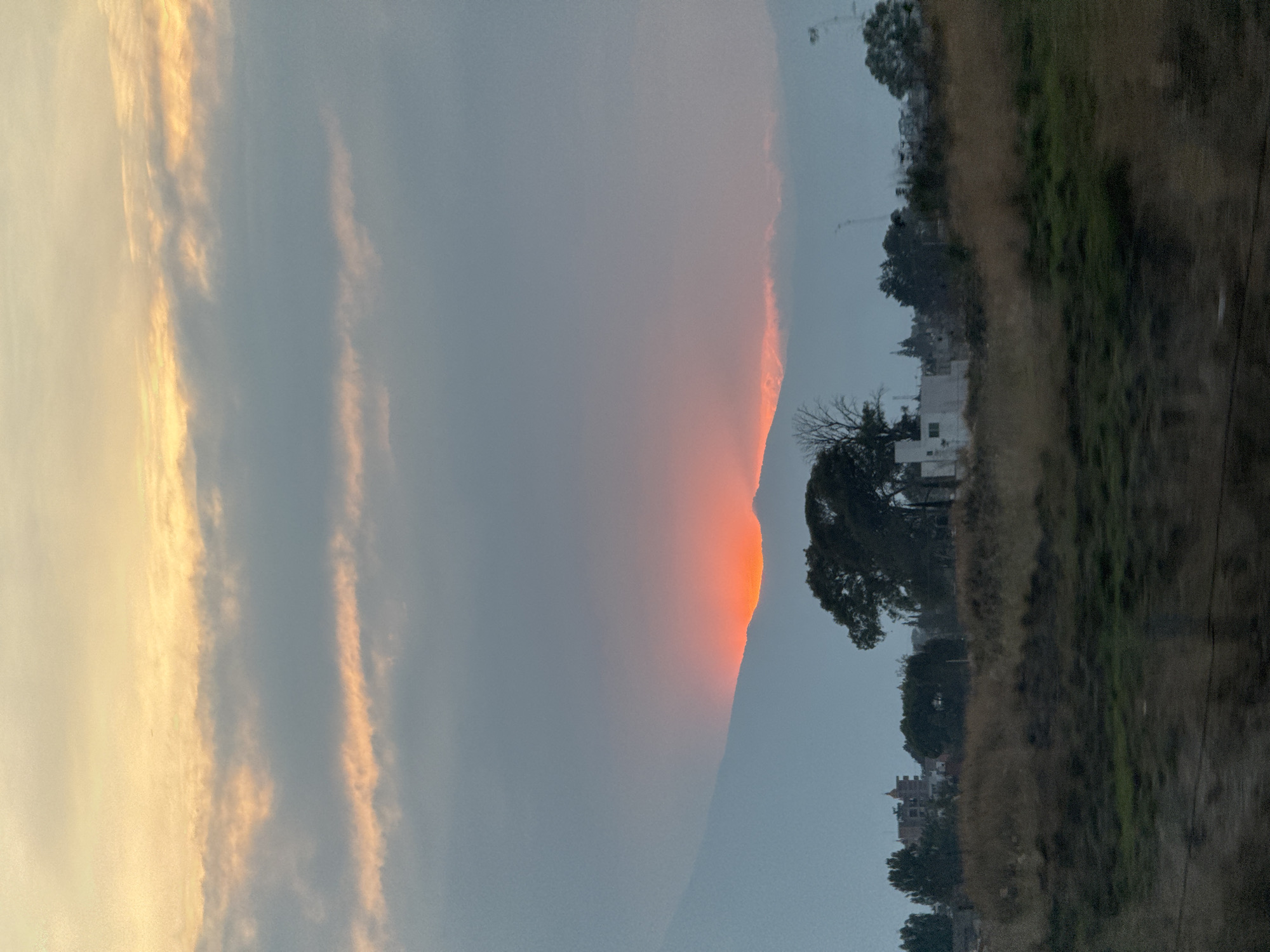 Bright orange light strikes mountain peak in Mexico