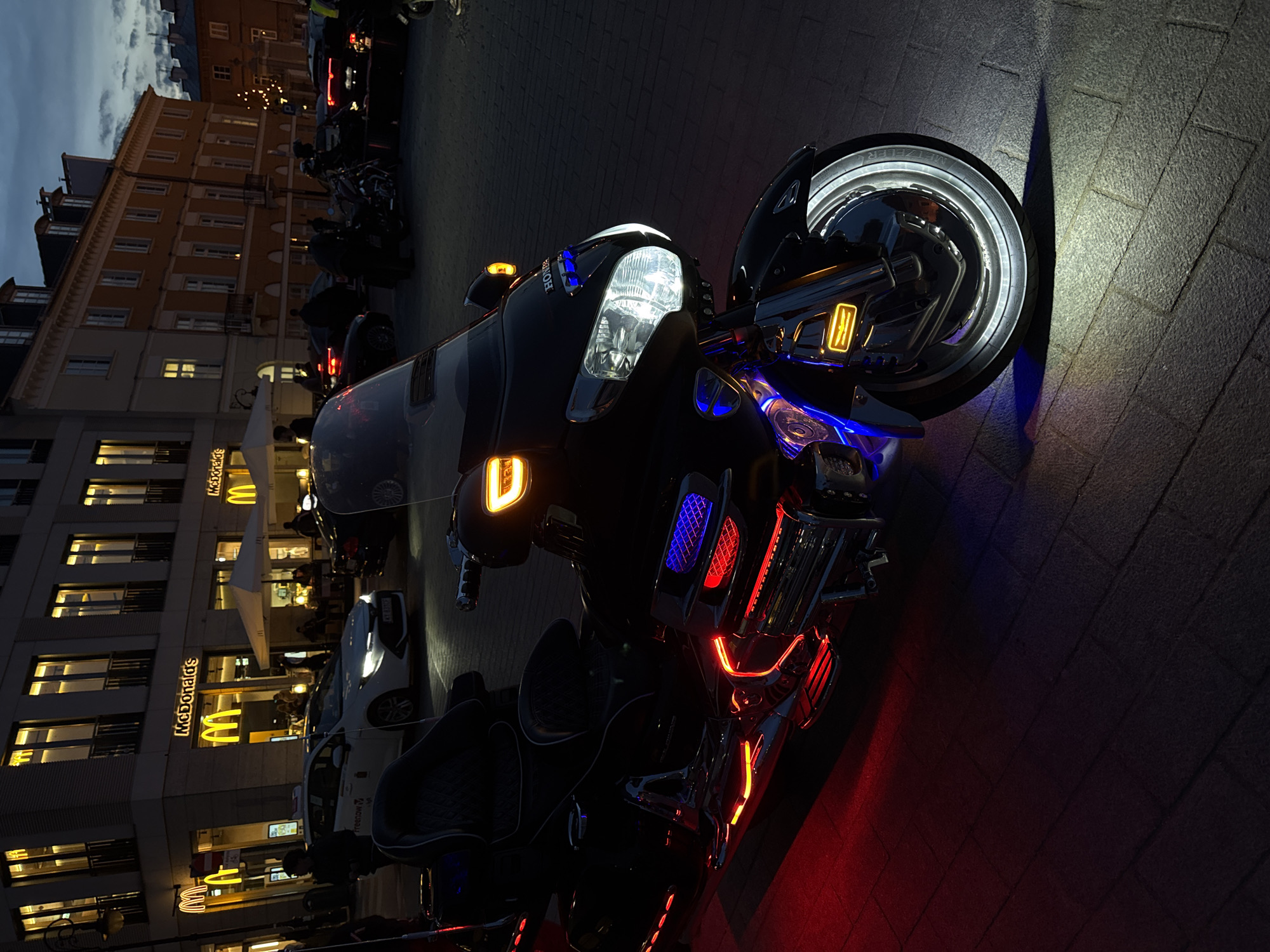 Motorcycle rally meets street performers in Warsaw's Old Town