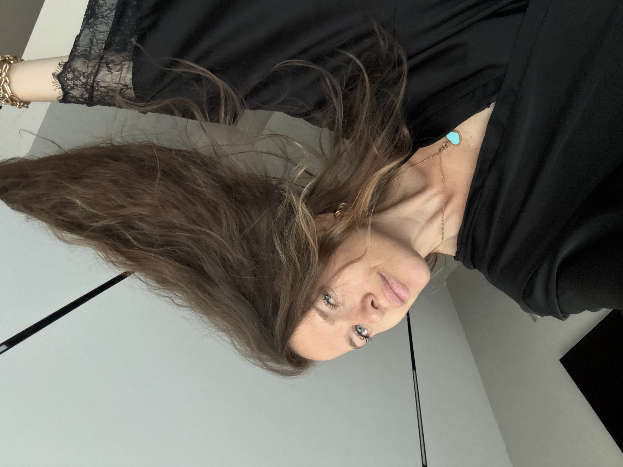 Back-to-back selfies in Dolgoprudny, lace top and turquoise pendant