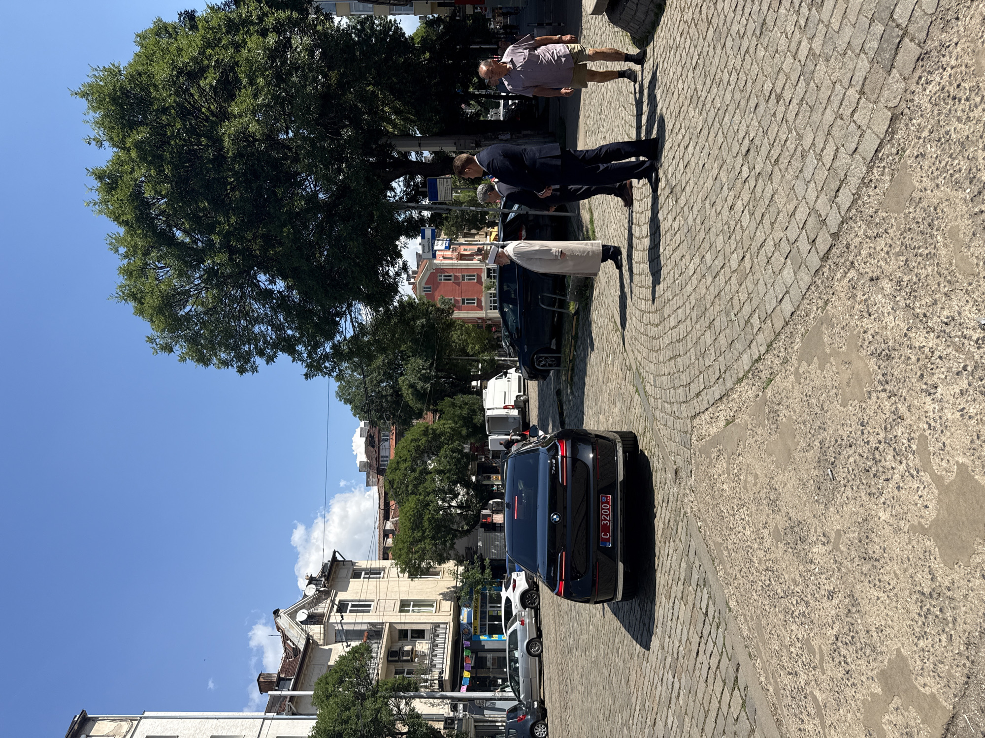 Sofia tram street scene near a Cambridge English exam center