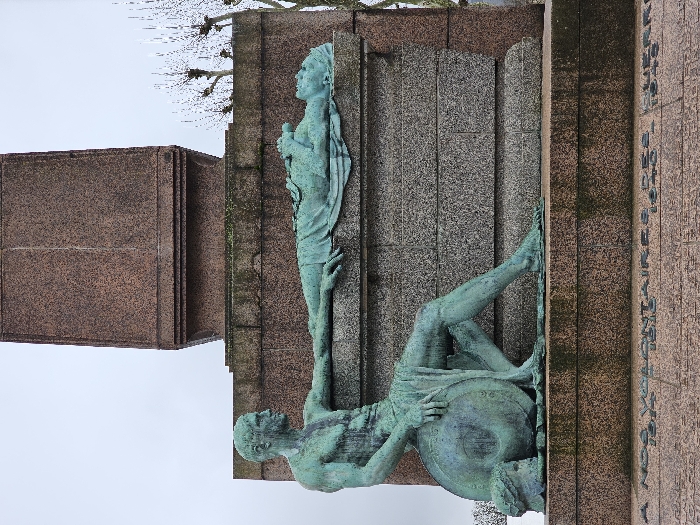 Tourist documents Luxembourg City landmarks during afternoon walking tour