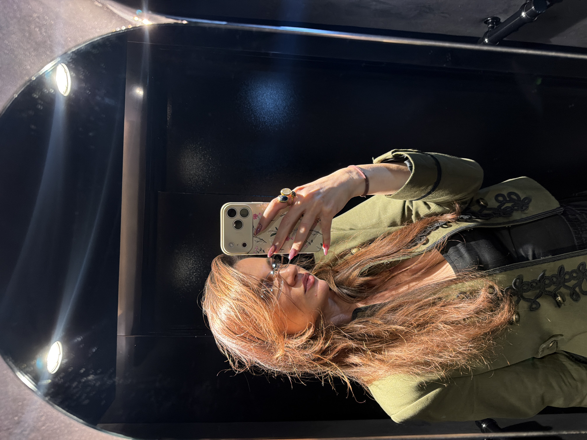 Mirror selfie captured in indoor Athens location