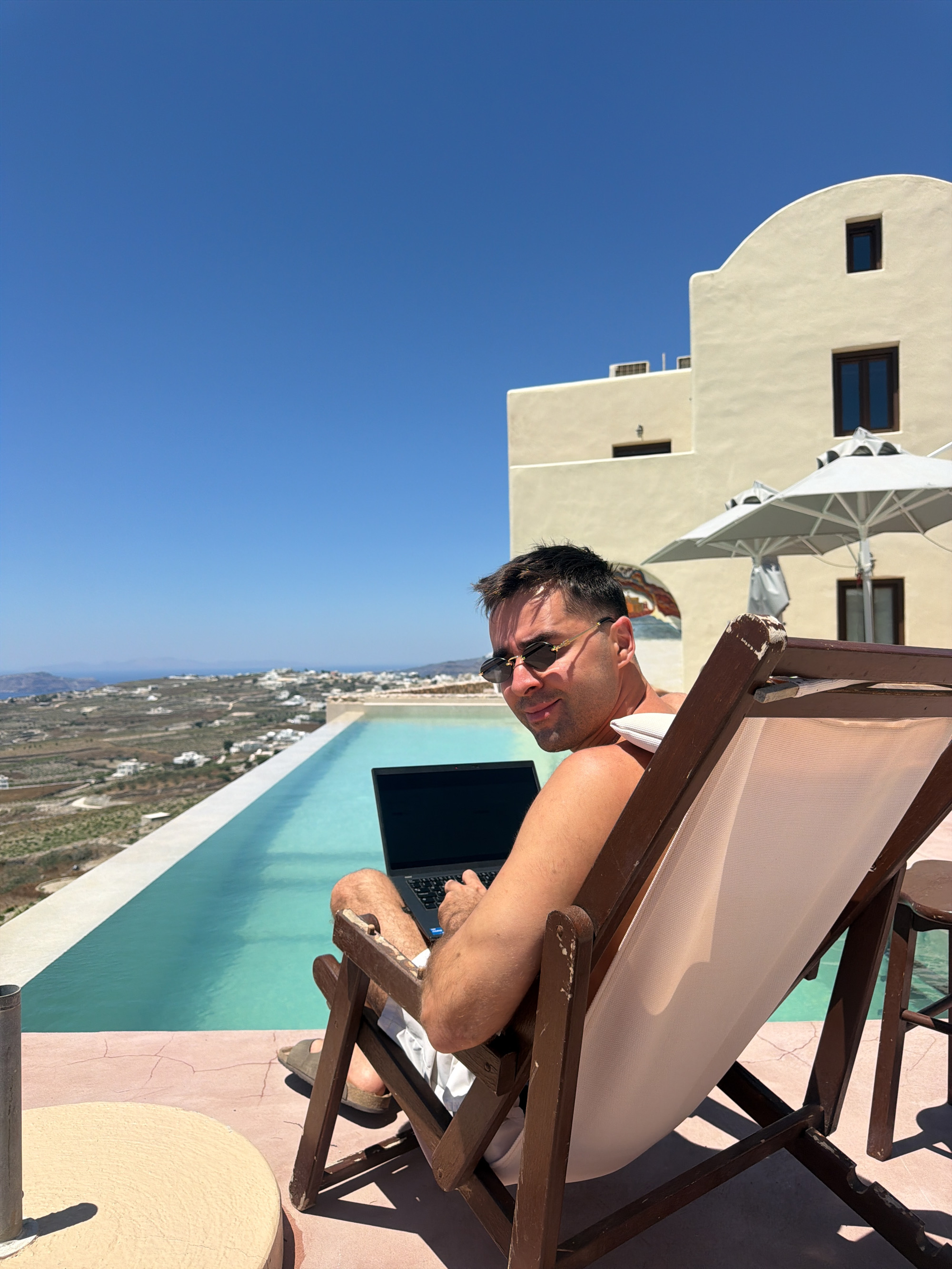 Working remotely from a Santorini infinity pool