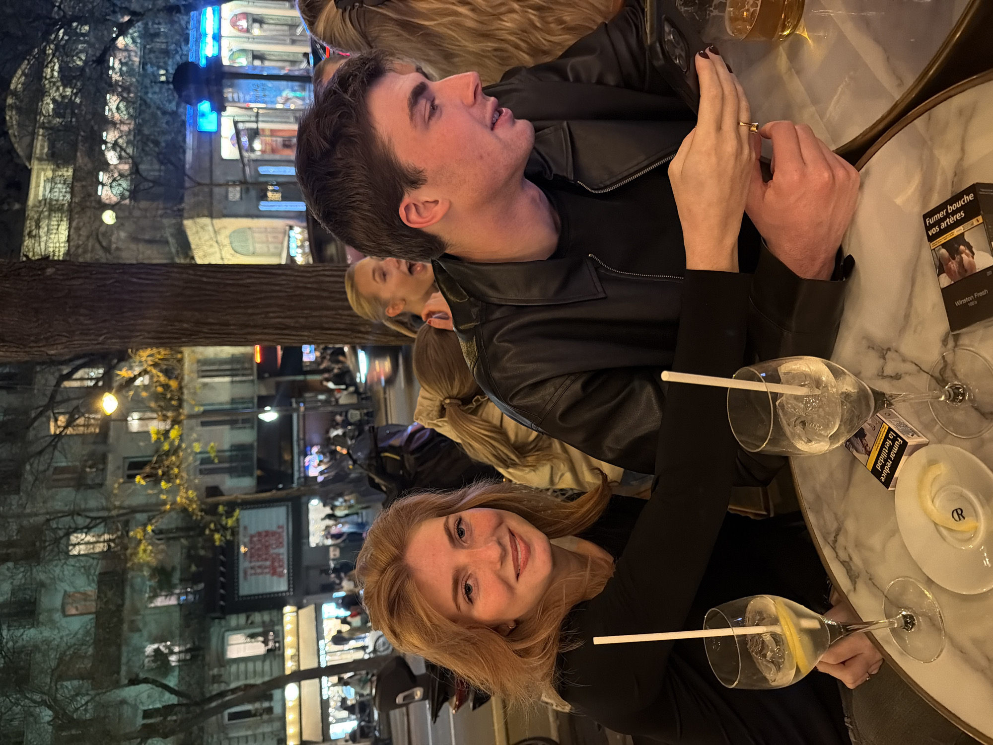 Evening dining scenes captured across Paris restaurants and cafes