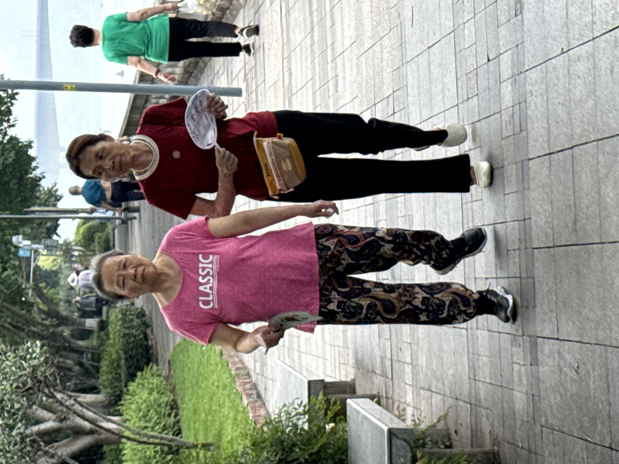 Residents enjoy routine activities along Jiangjin riverside promenade