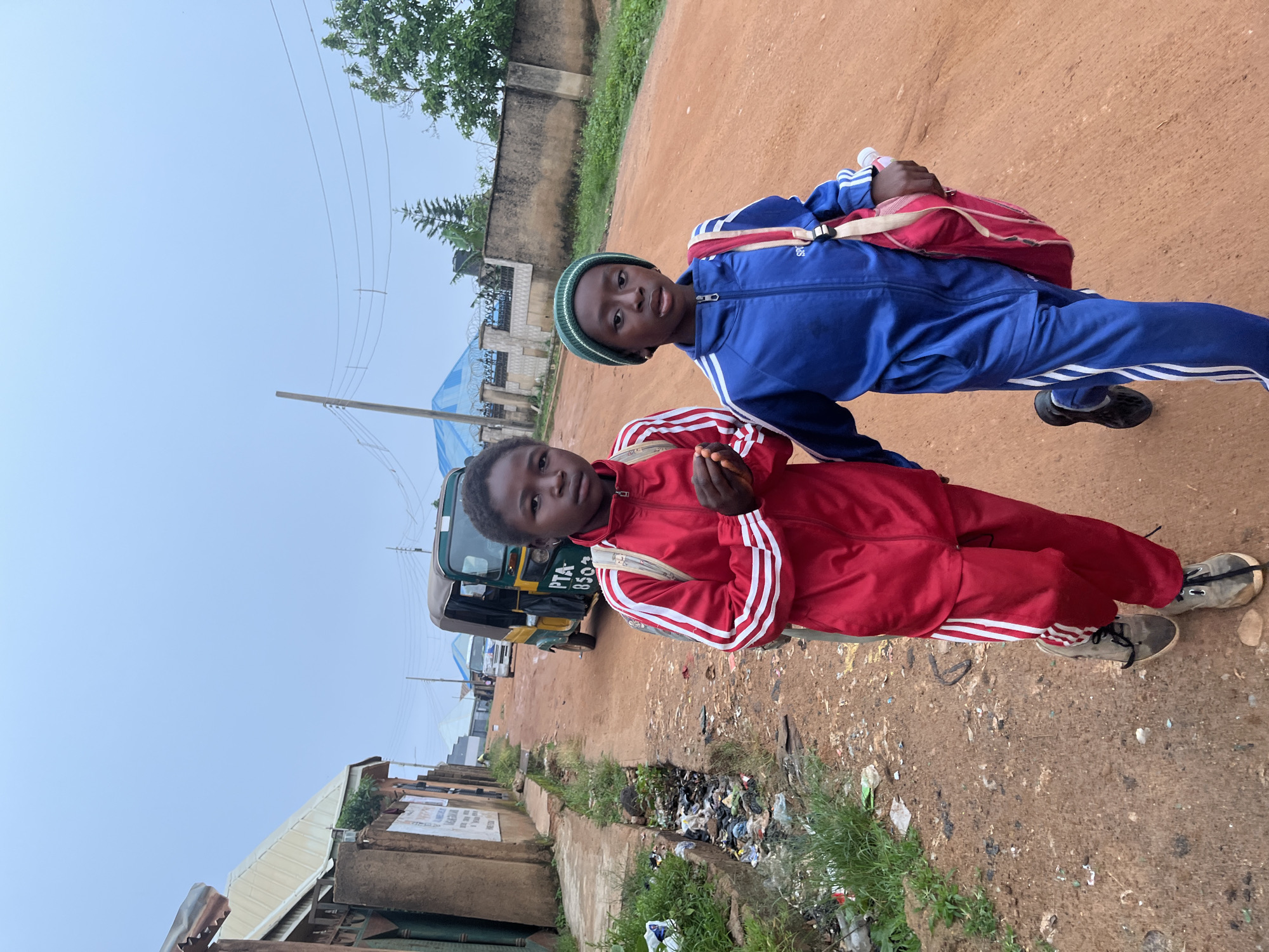 Morning street life in a Jos, Nigeria neighborhood