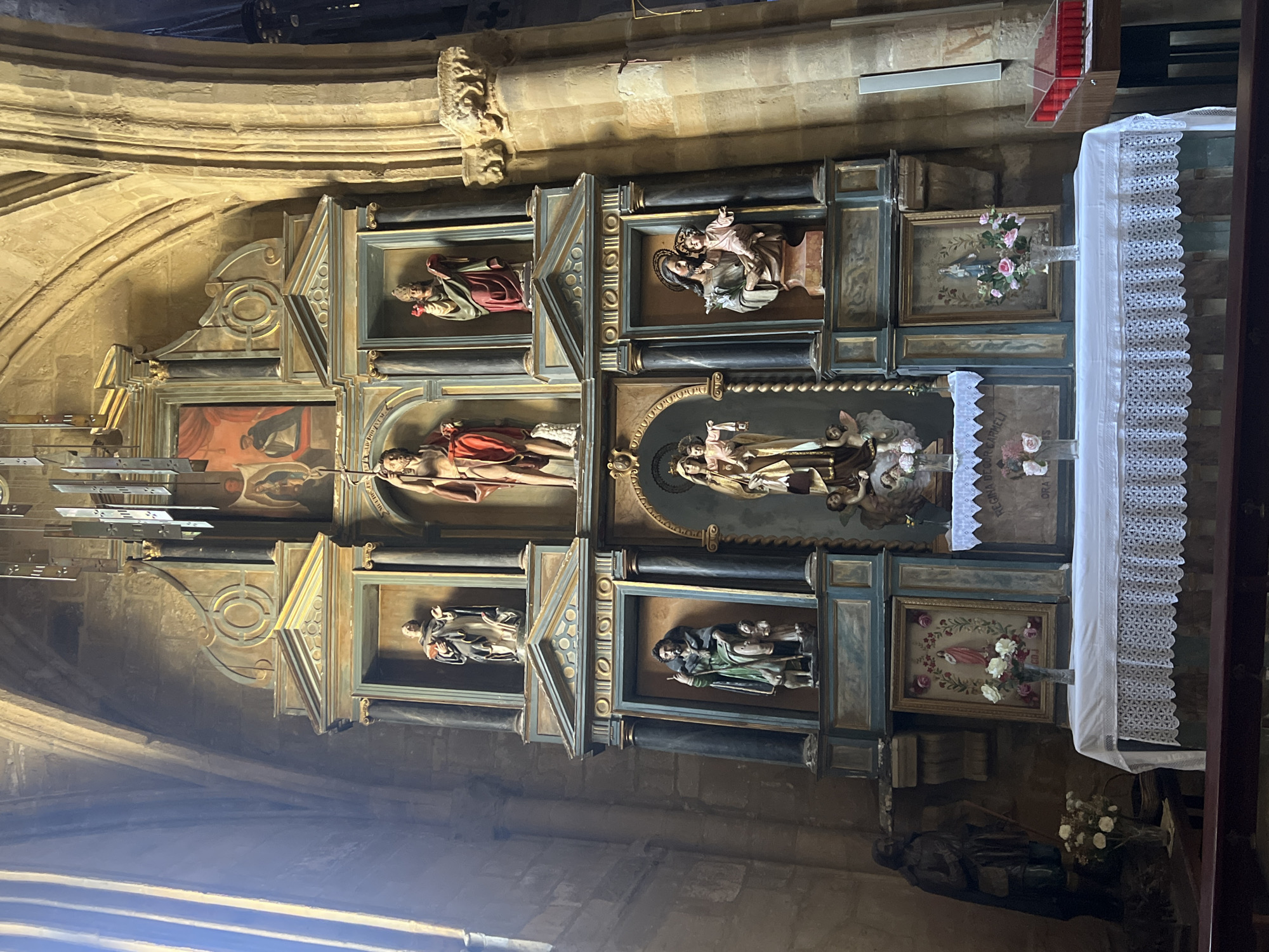 Church and restaurant scenes in historic Getaria, Spain