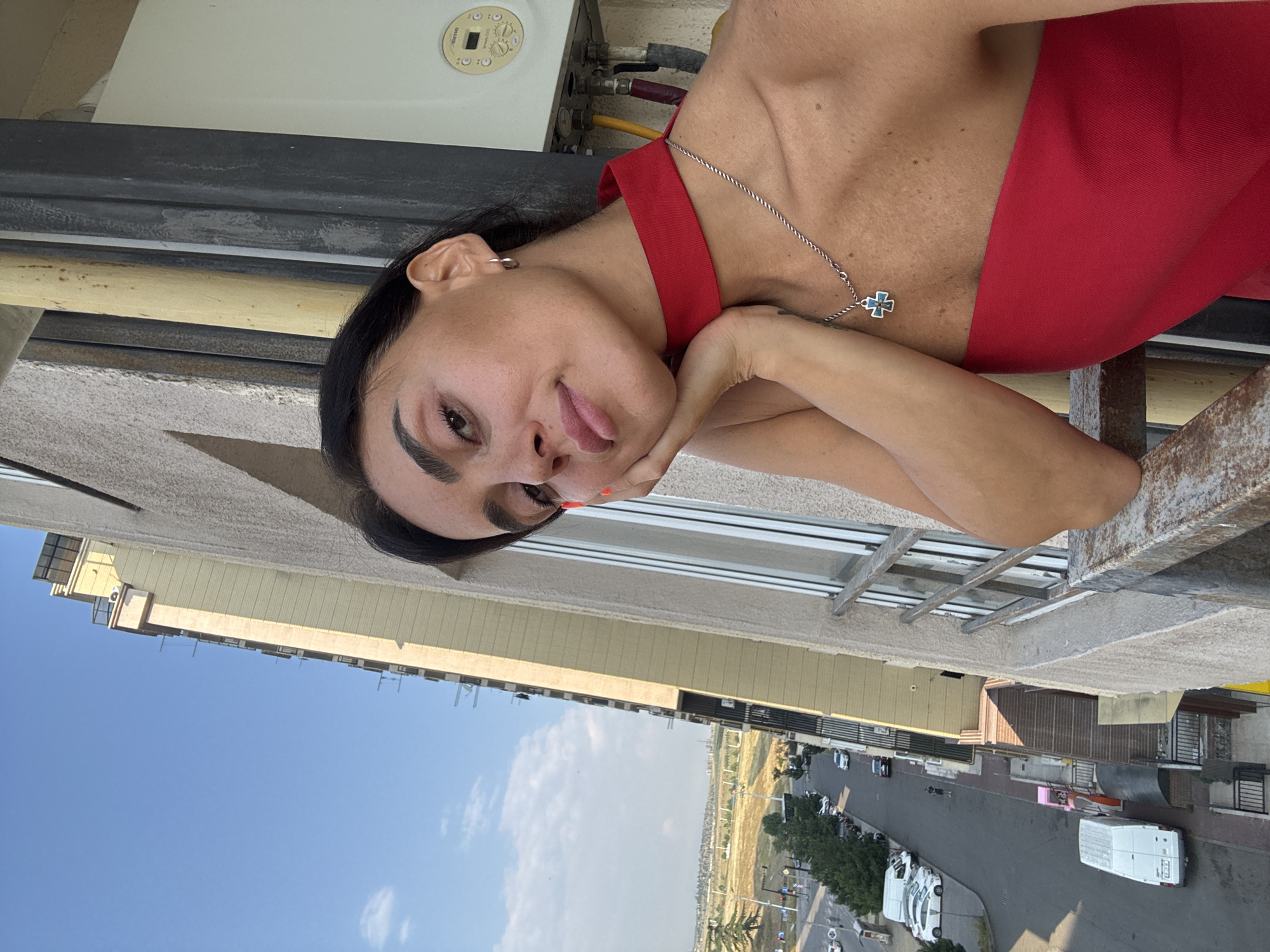 Late-night selfie session across a Tbilisi balcony and apartment interior