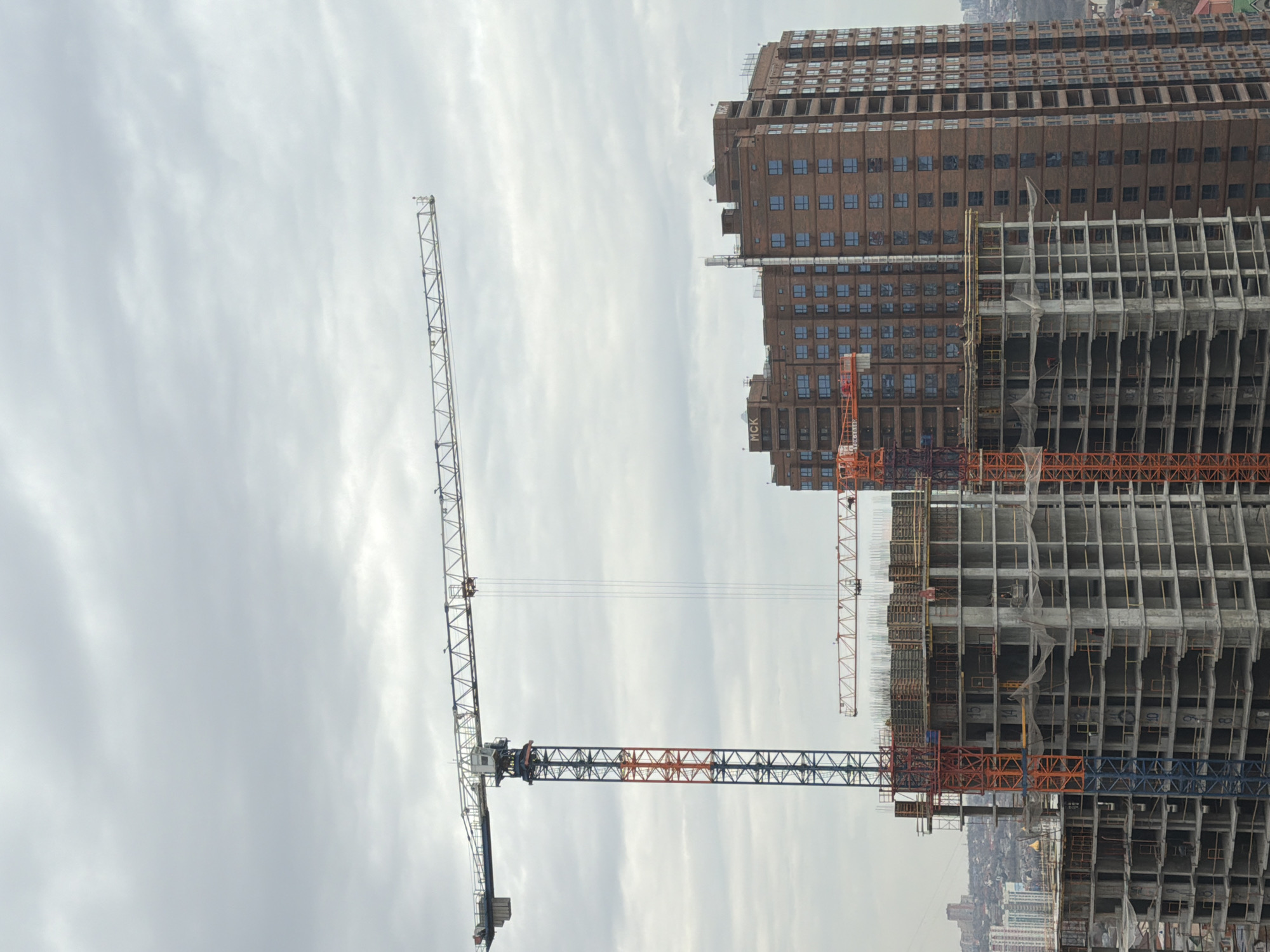 Tower cranes active at construction site in Novoalexandrovka