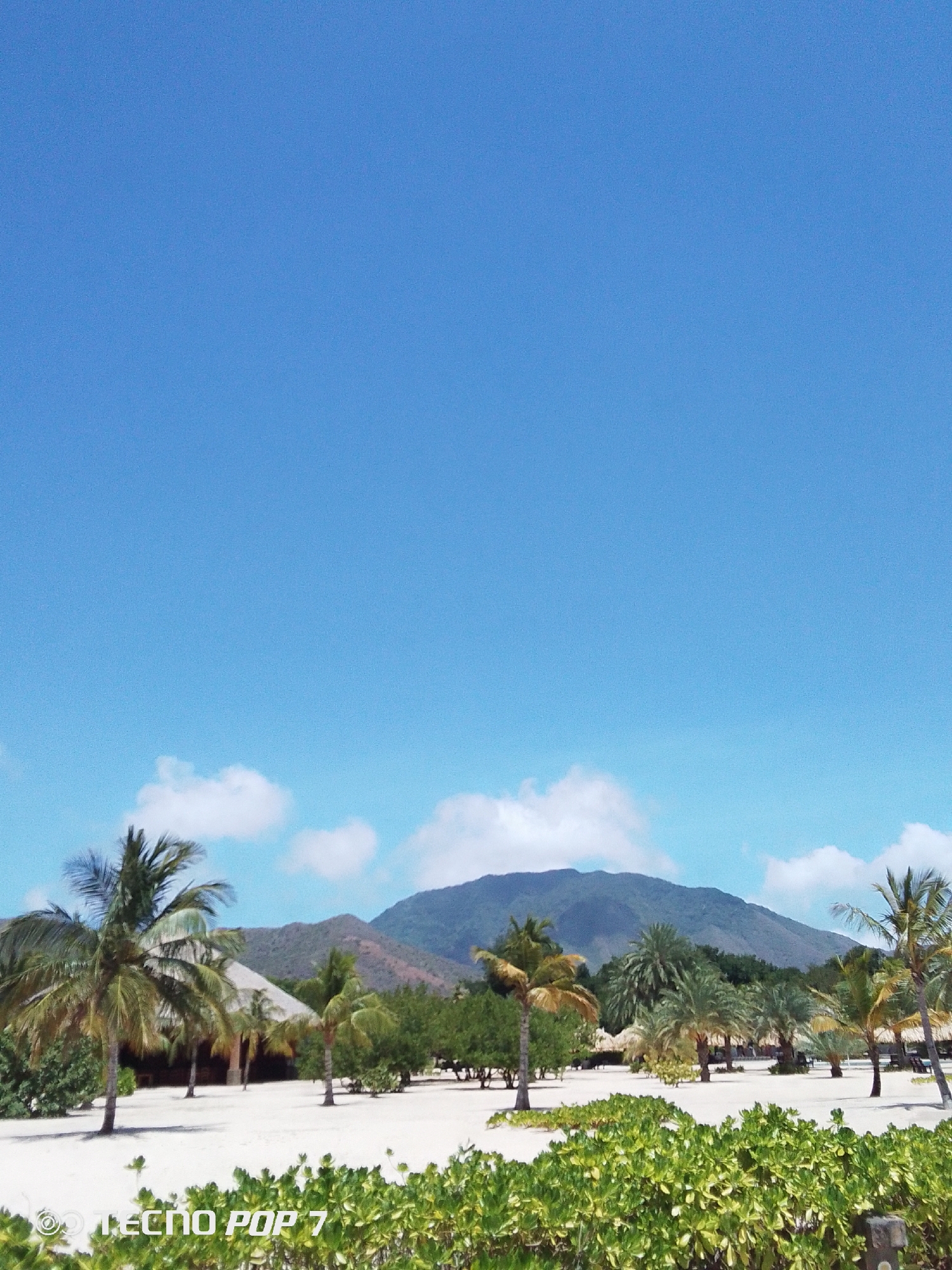 Tourist captures scenic beach and nature views in Pedro González