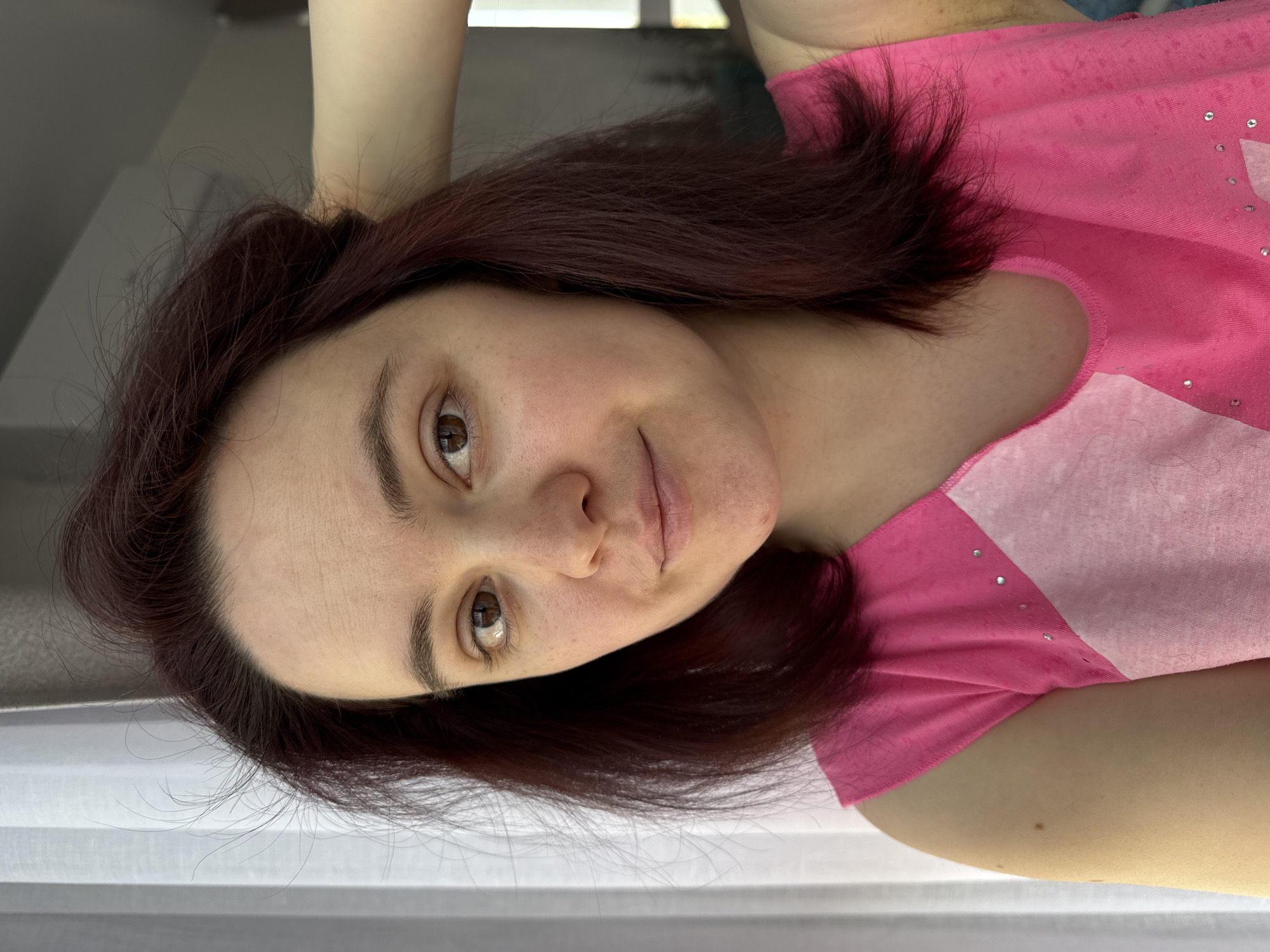 Woman gets hair styled in Izhevsk morning routine
