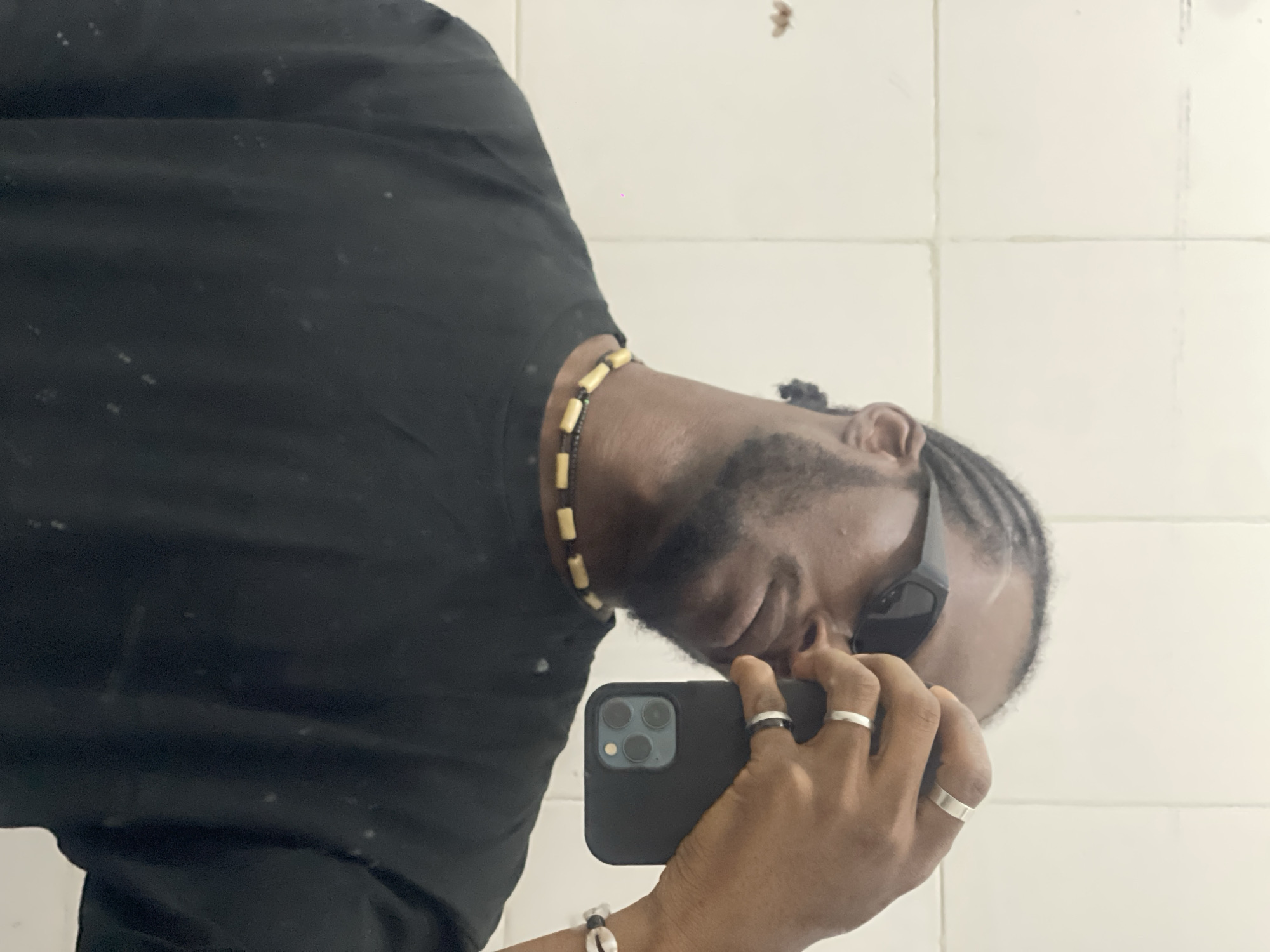 Man takes mirror selfies in Jos, Nigeria