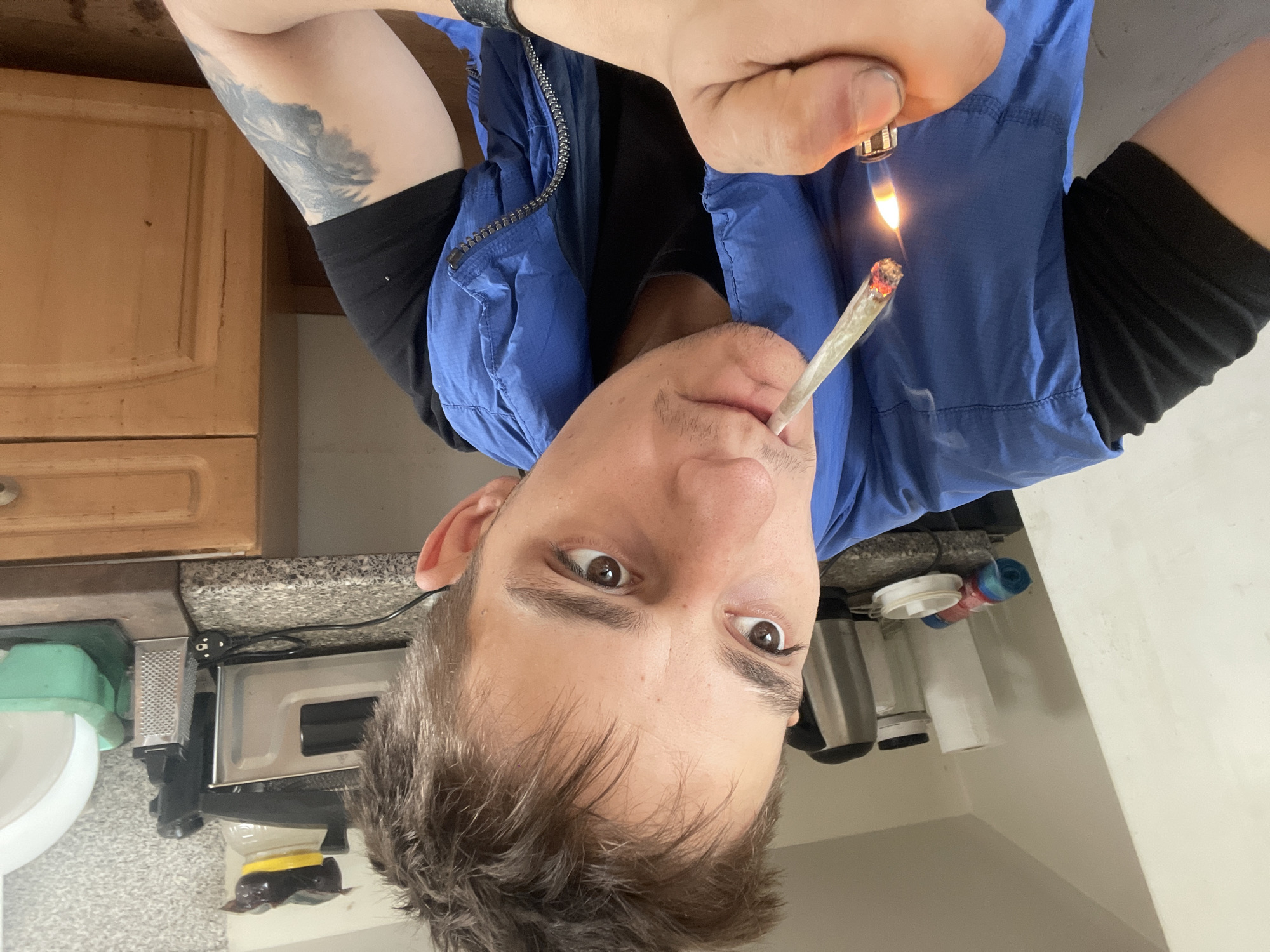 Young man documented smoking cannabis in kitchen over hour