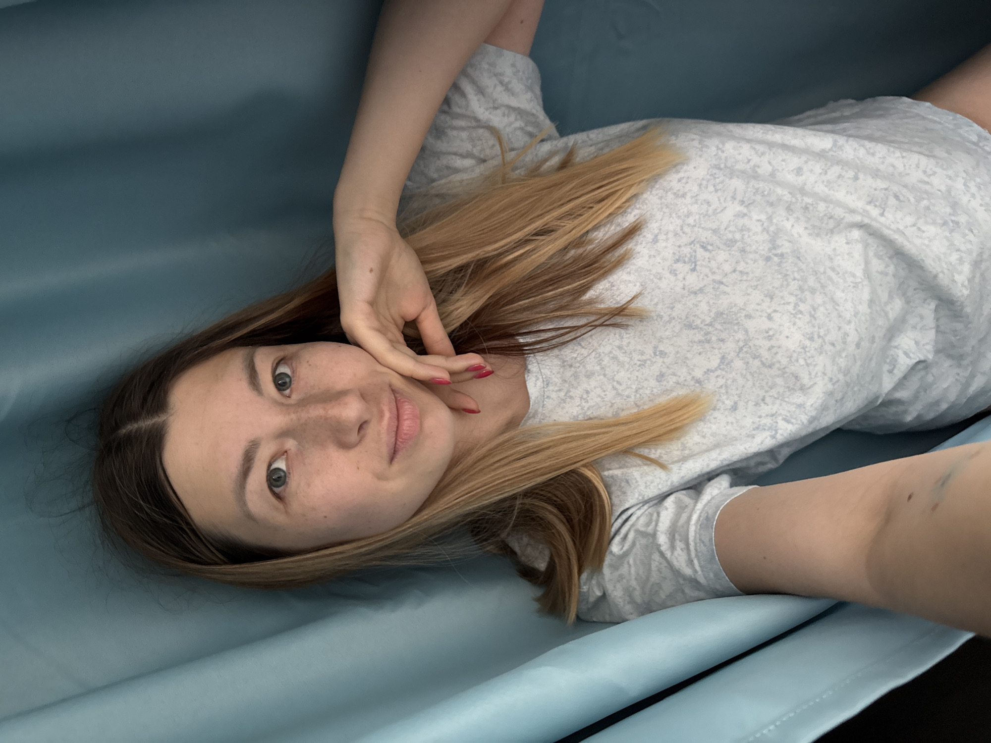 Casual bedroom selfies in Moscow, blue fabric and quiet surroundings.