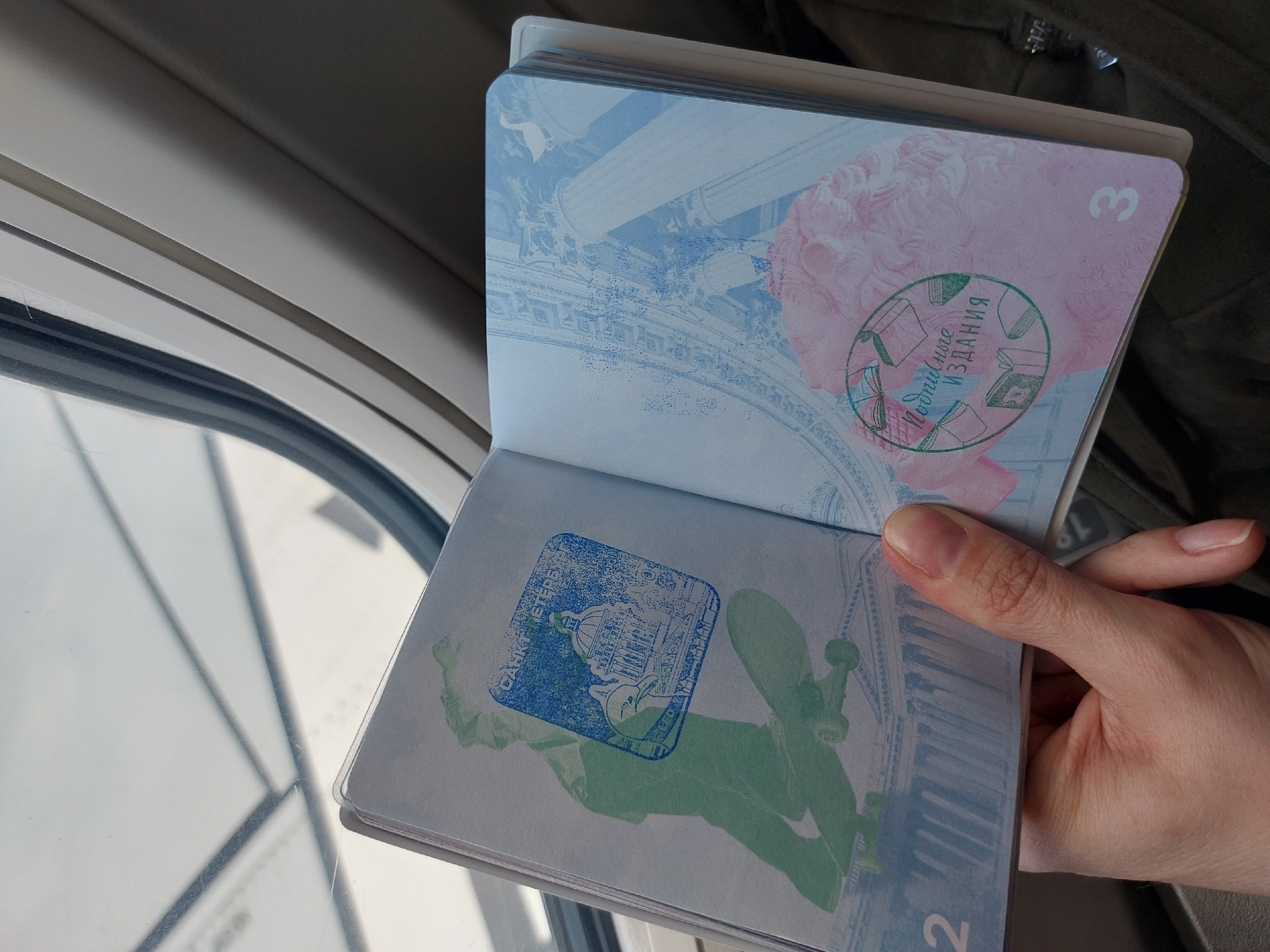 Passenger documents departure from Saint Petersburg airport with passport, boarding pass