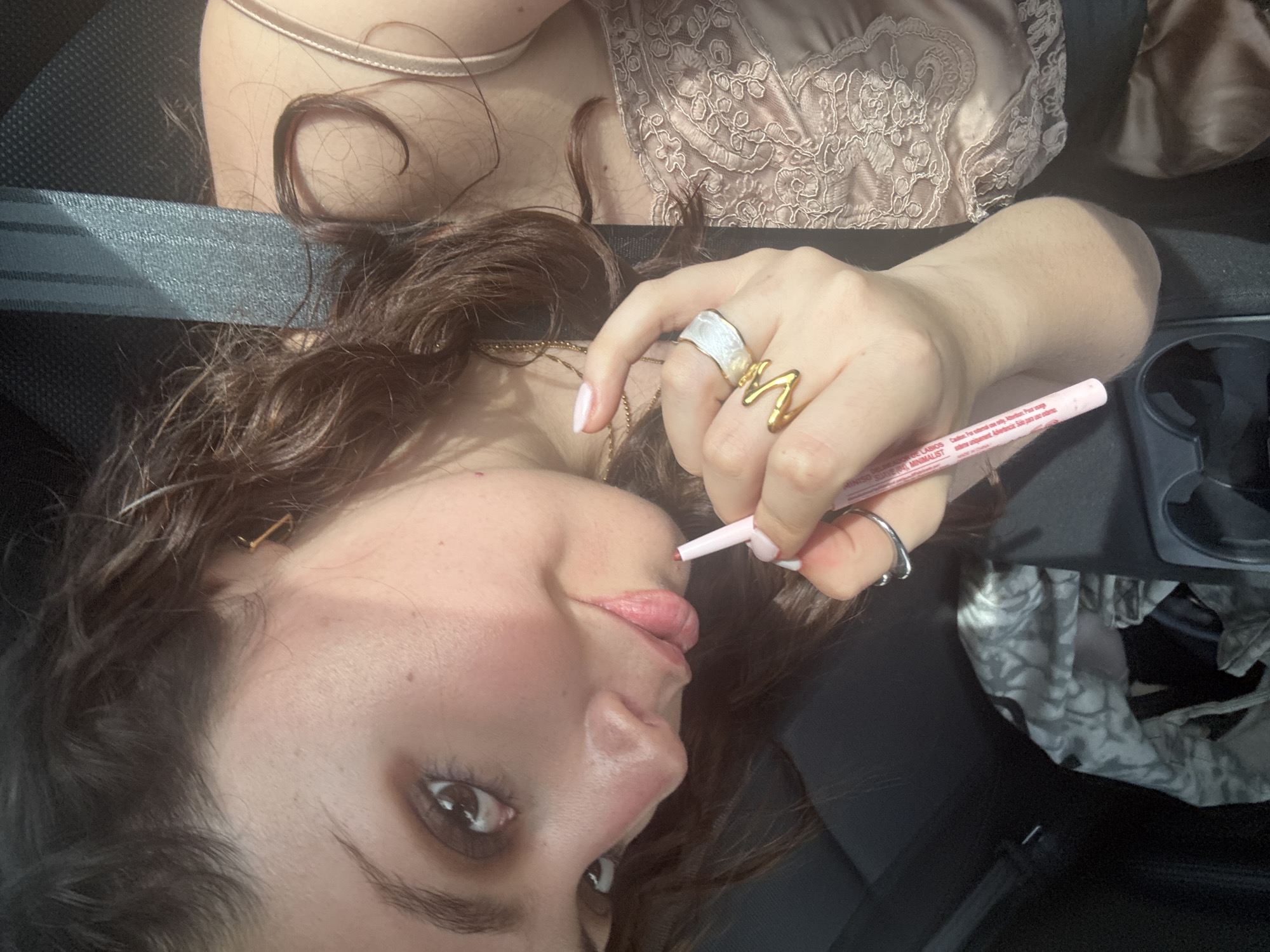 Woman applies makeup in car, Santa Clara Ocoyucan