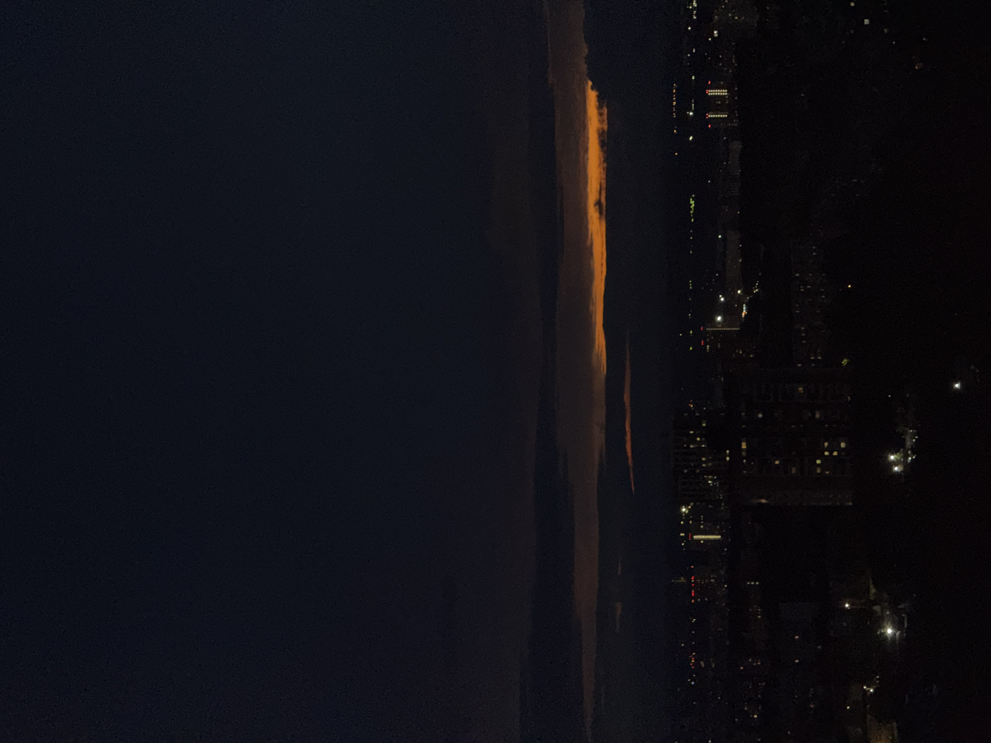 Orange clouds illuminate nighttime sky over Гамово, Russia