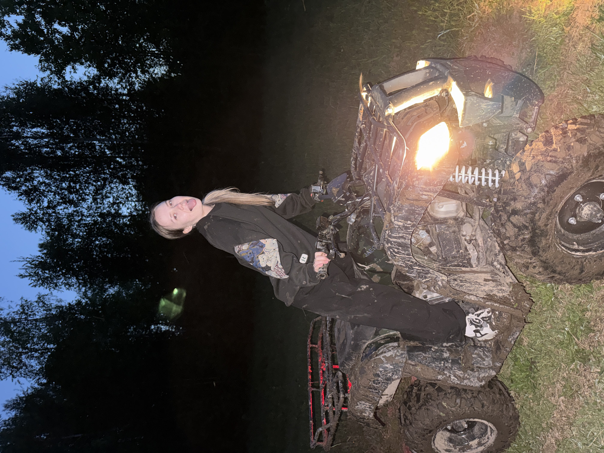 Woman on muddy ATV spotted in Russian woods