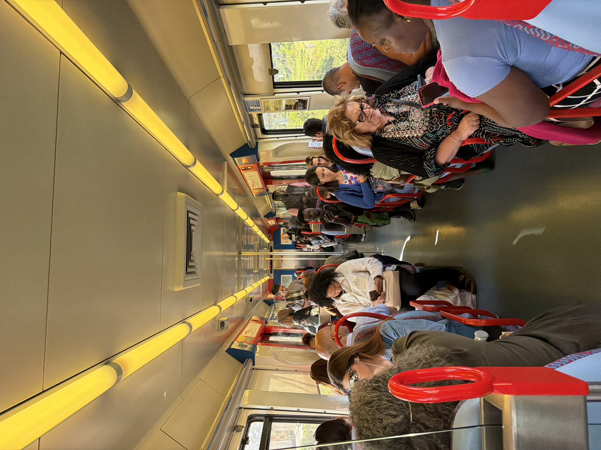 Routine commuter moments captured on Lisbon metro train